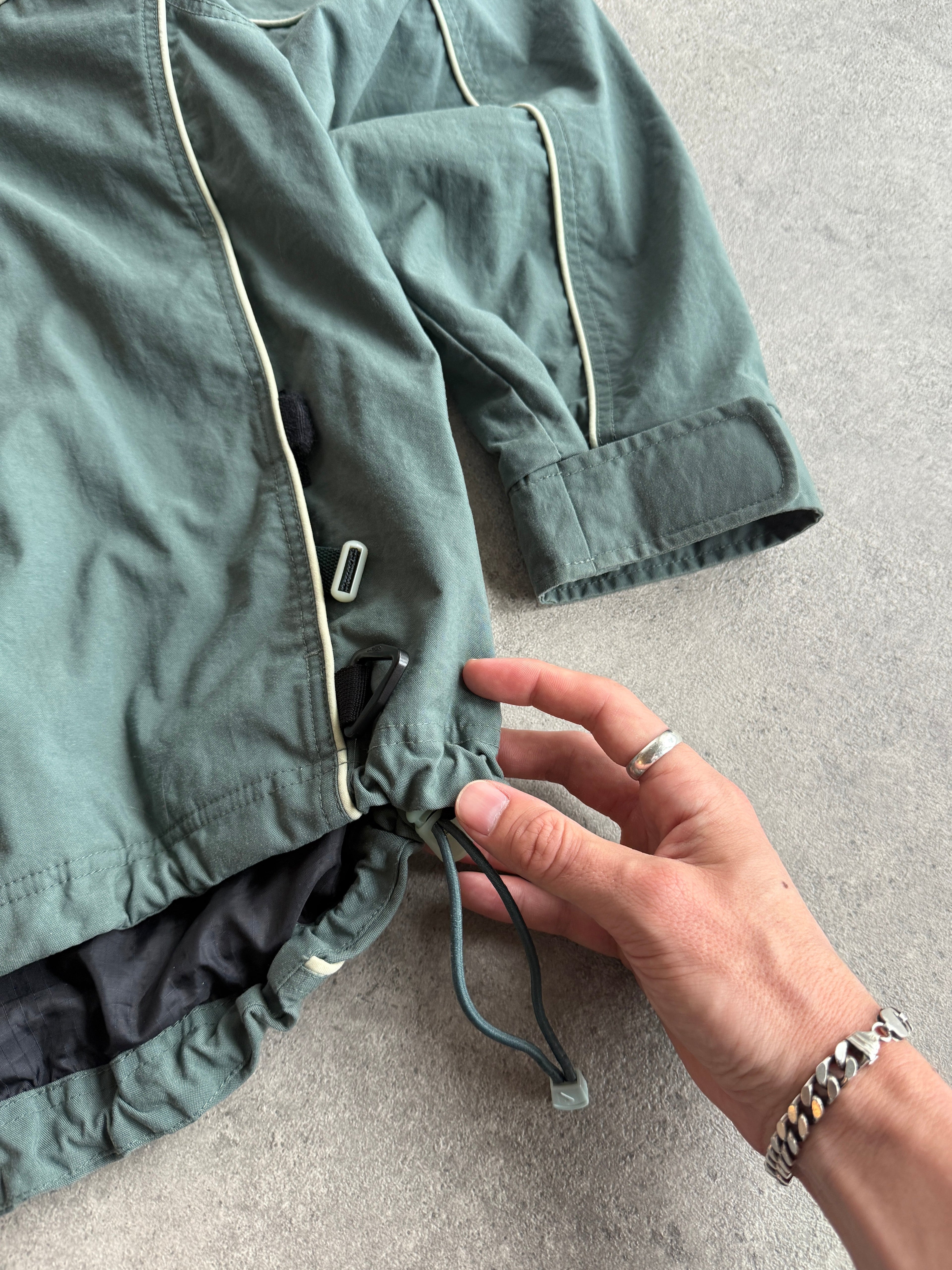nike acg 1990s storm fit heavyweight technical waterproof jacket, orange neck loop detail