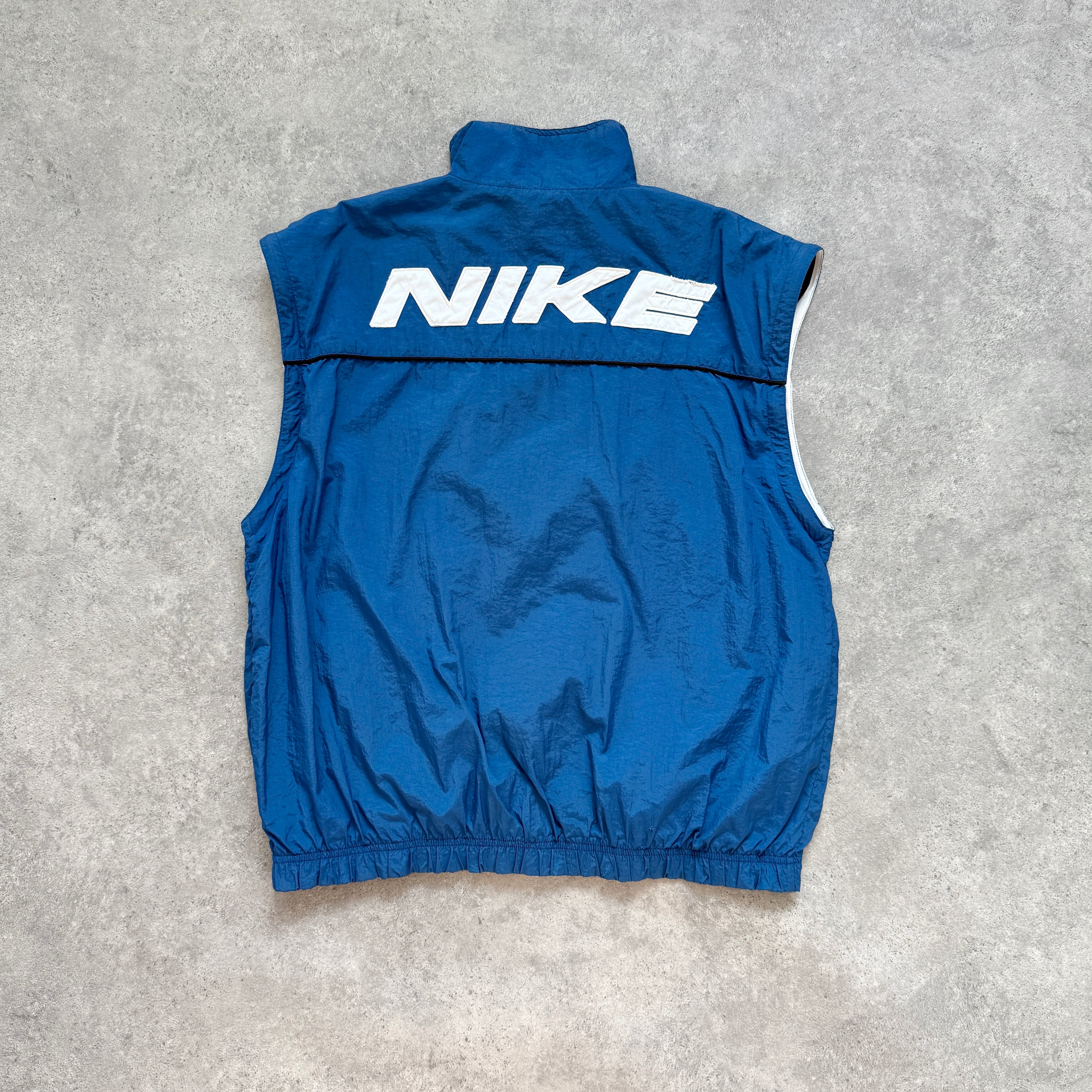 Nike 1990s lightweight convertible spellout shell jacket (M)