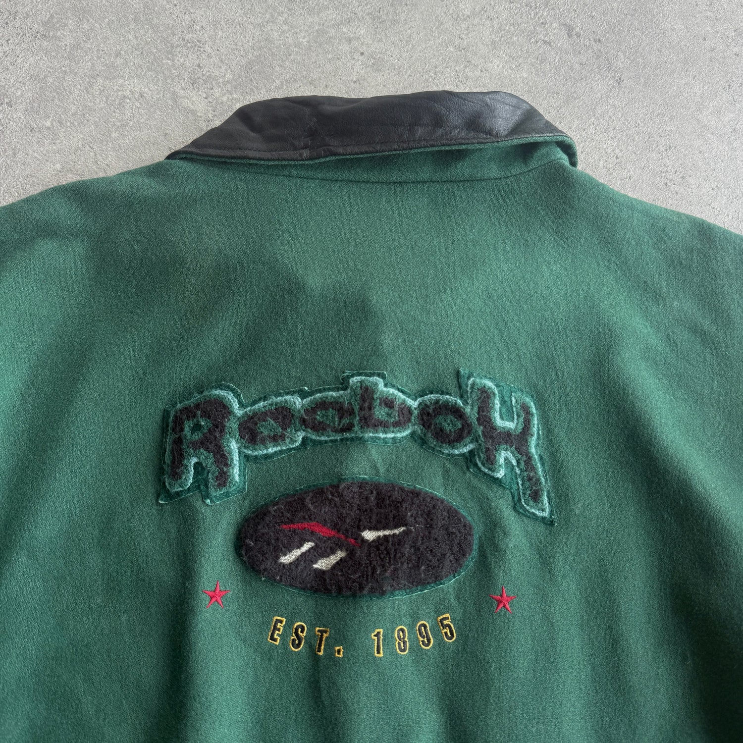 Reebok RARE 1990s heavyweight spellout leather varsity jacket (XL)