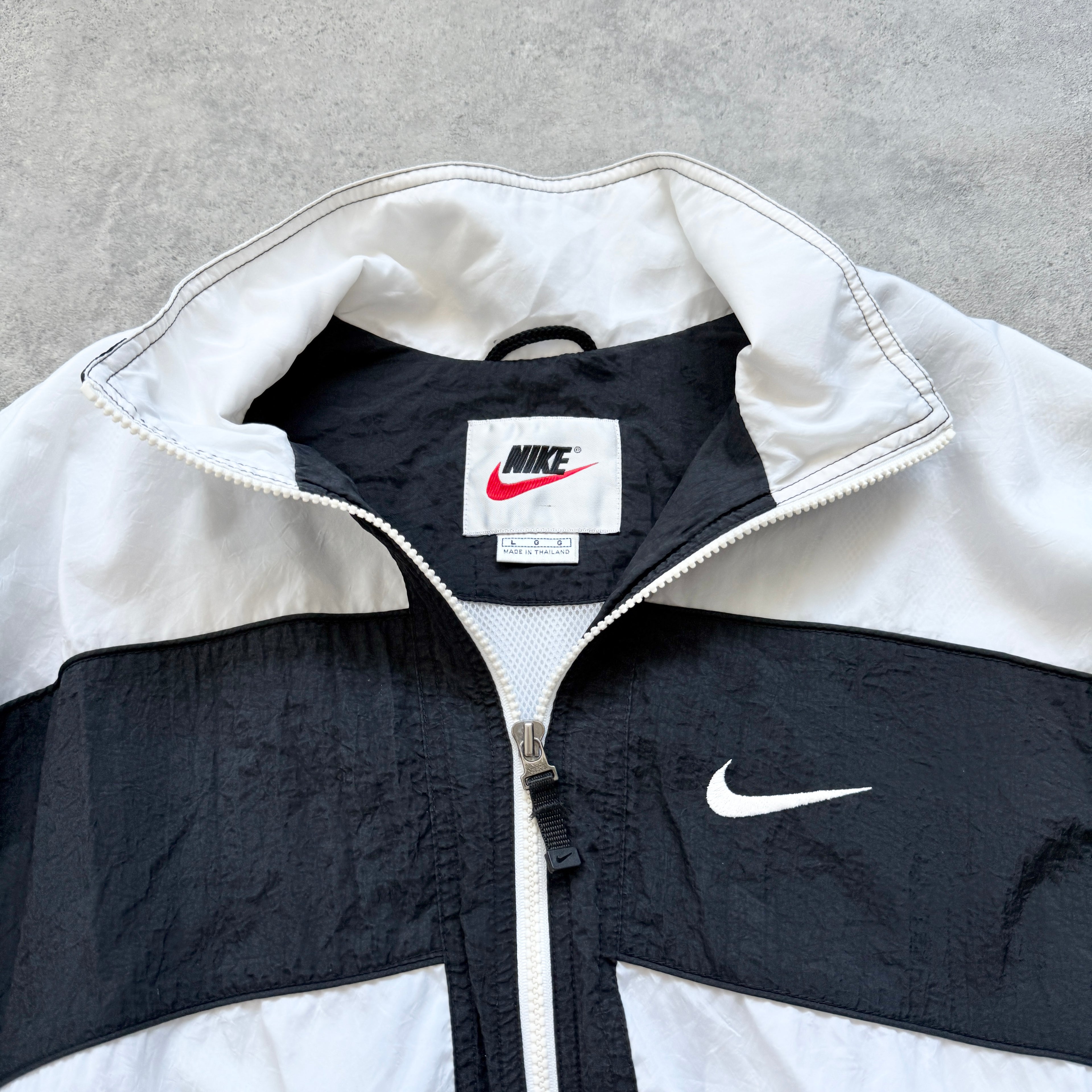 Nike 1990s lightweight convertible spellout shell jacket (L)