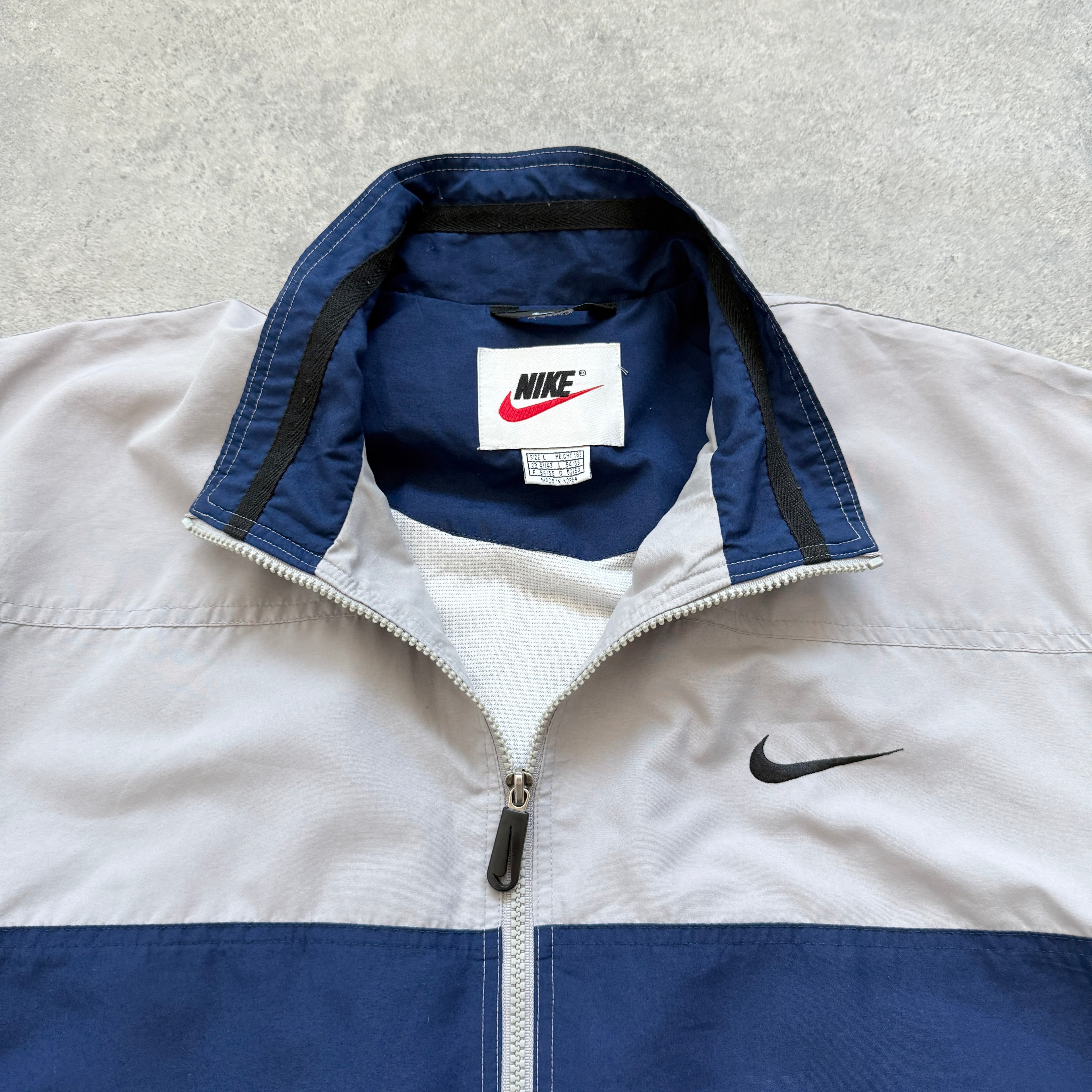 Nike 1990s lightweight embroidered spellout track jacket (L)