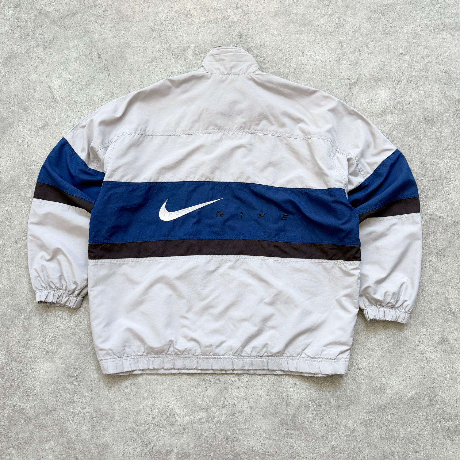 Nike 1990s lightweight embroidered spellout track jacket (L)