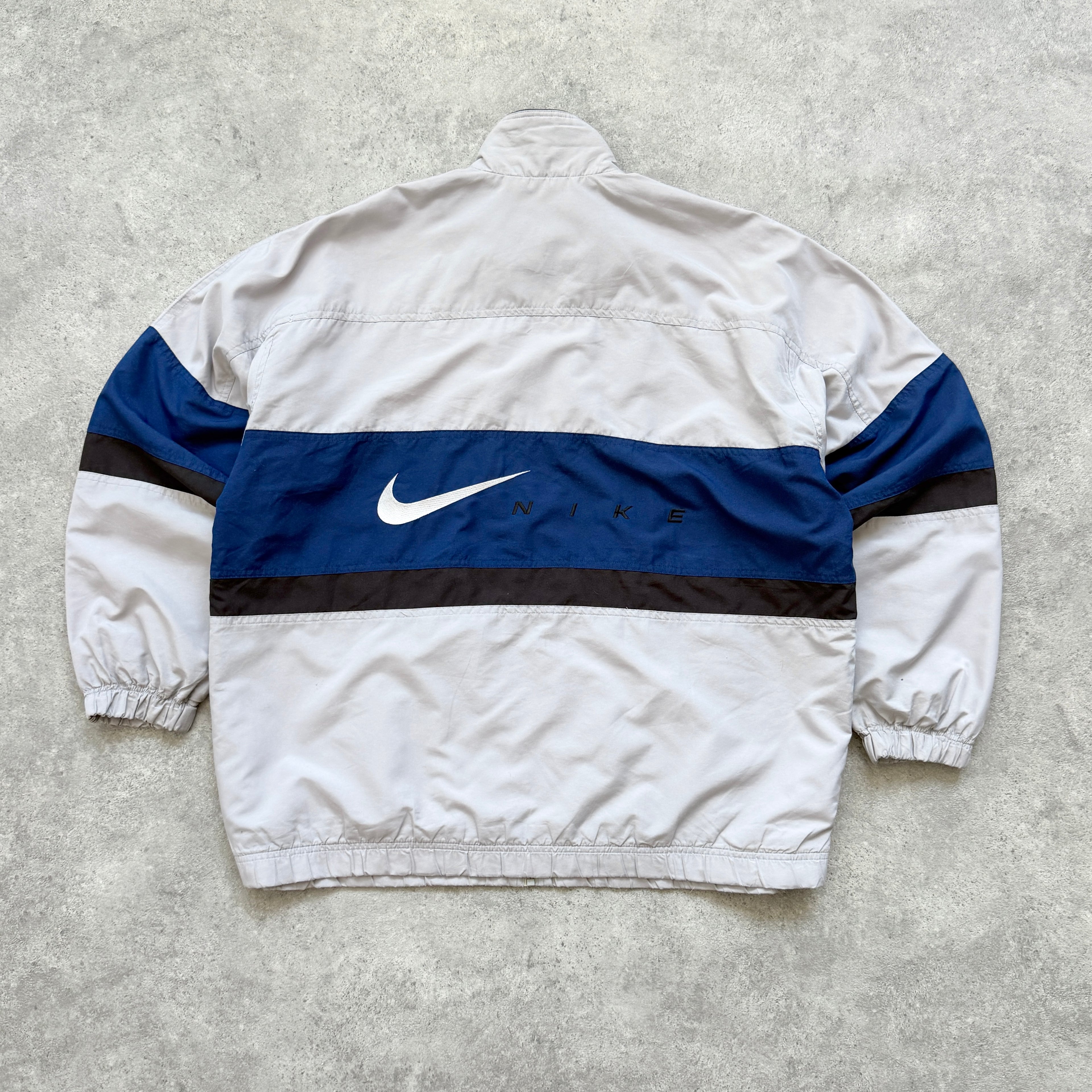 Nike 1990s lightweight embroidered spellout track jacket (L)