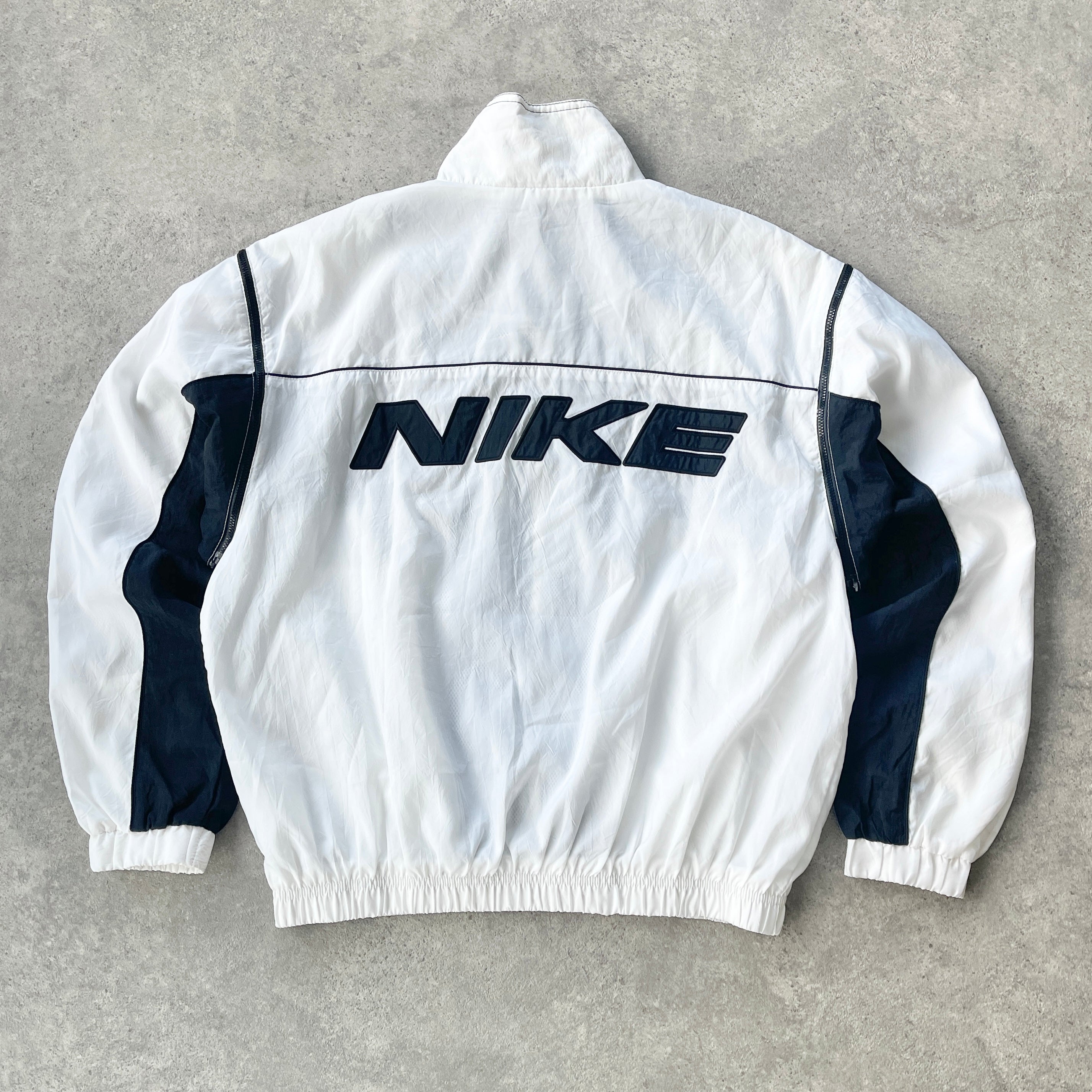 Nike 1990s lightweight convertible spellout shell jacket (L)