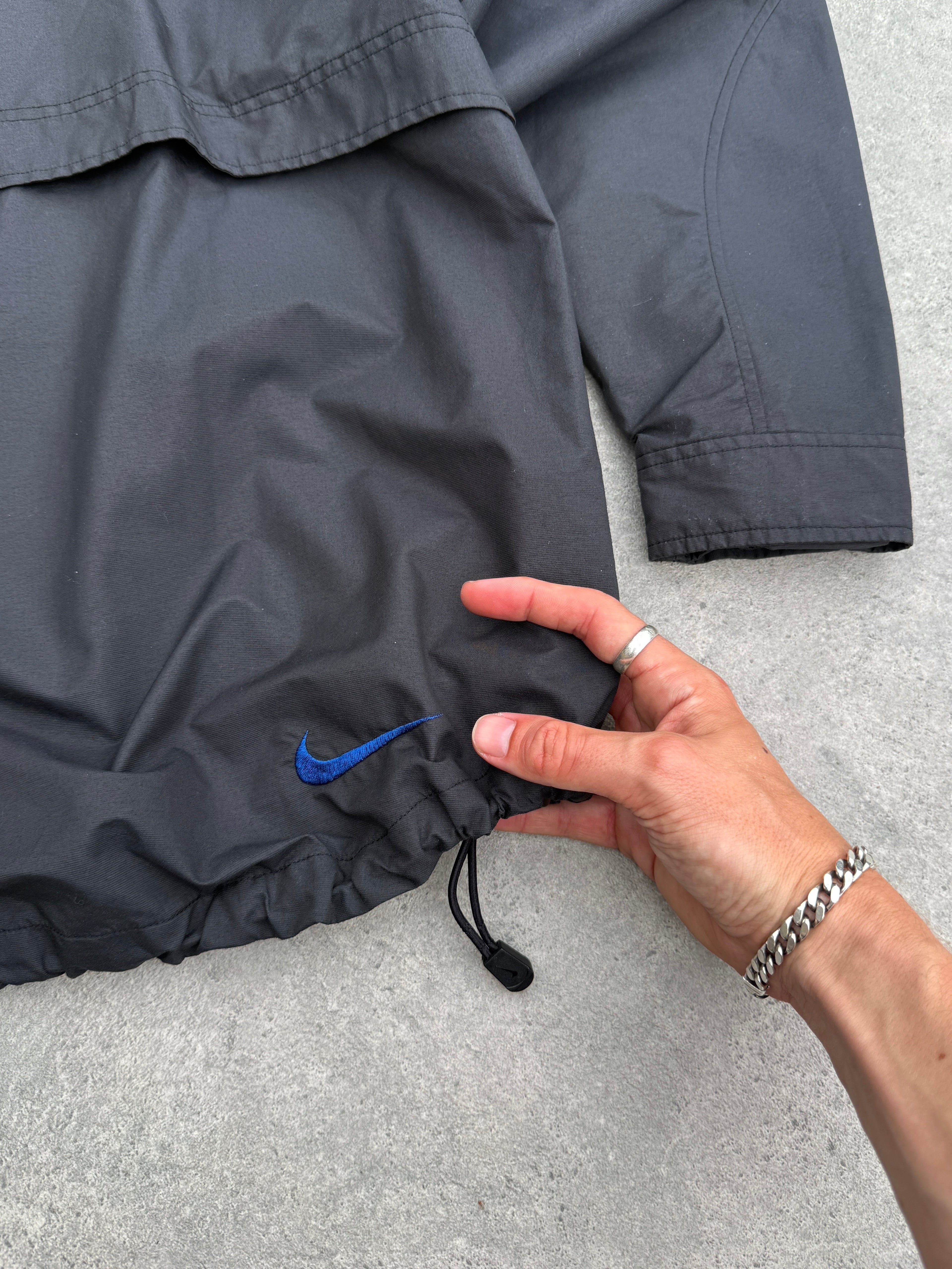 nike acg 1990s lightweight technical waterproof jacket, hem toggle detail