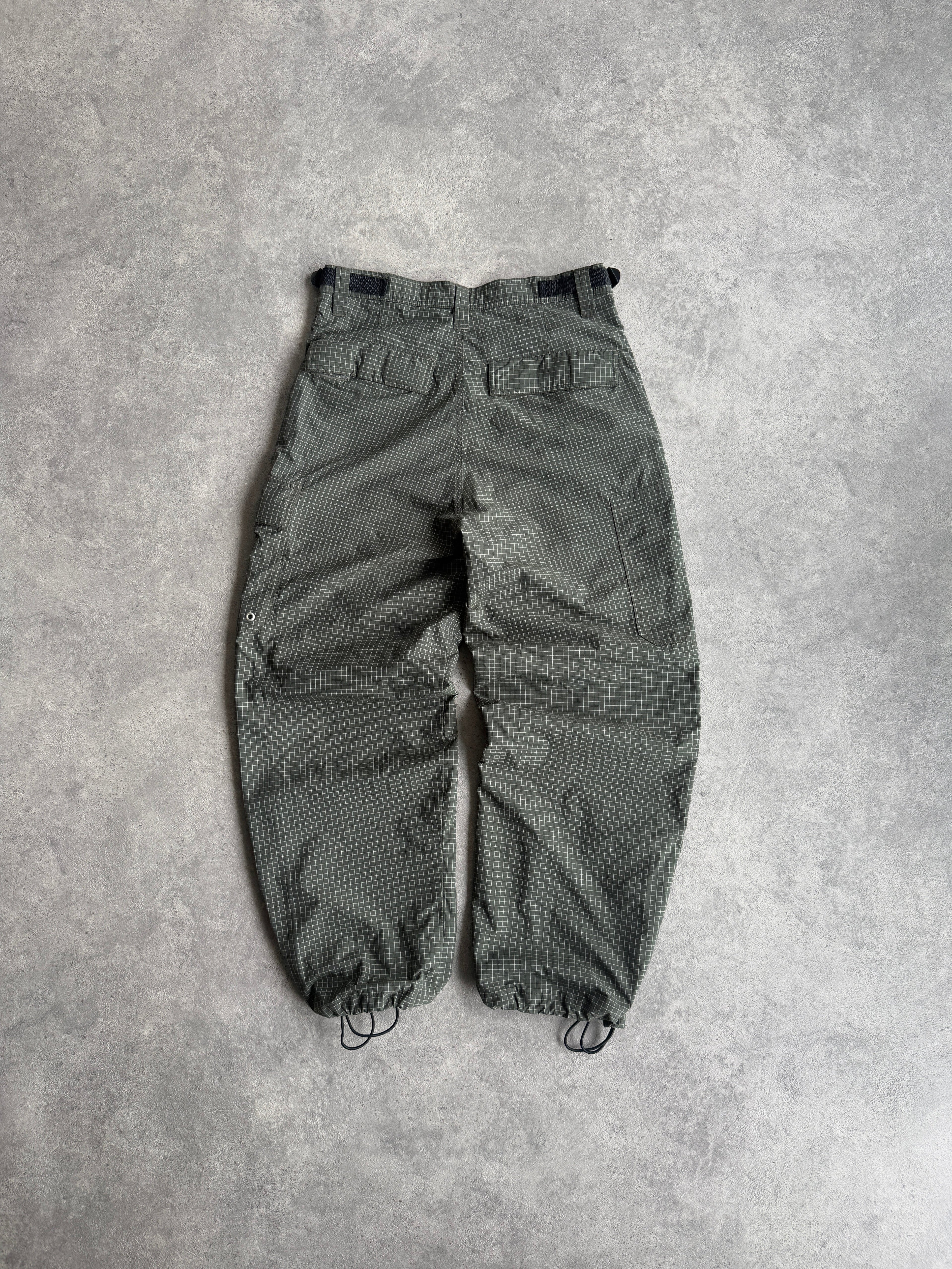 stussy 1990s technical parachute pants in olive grid, back view