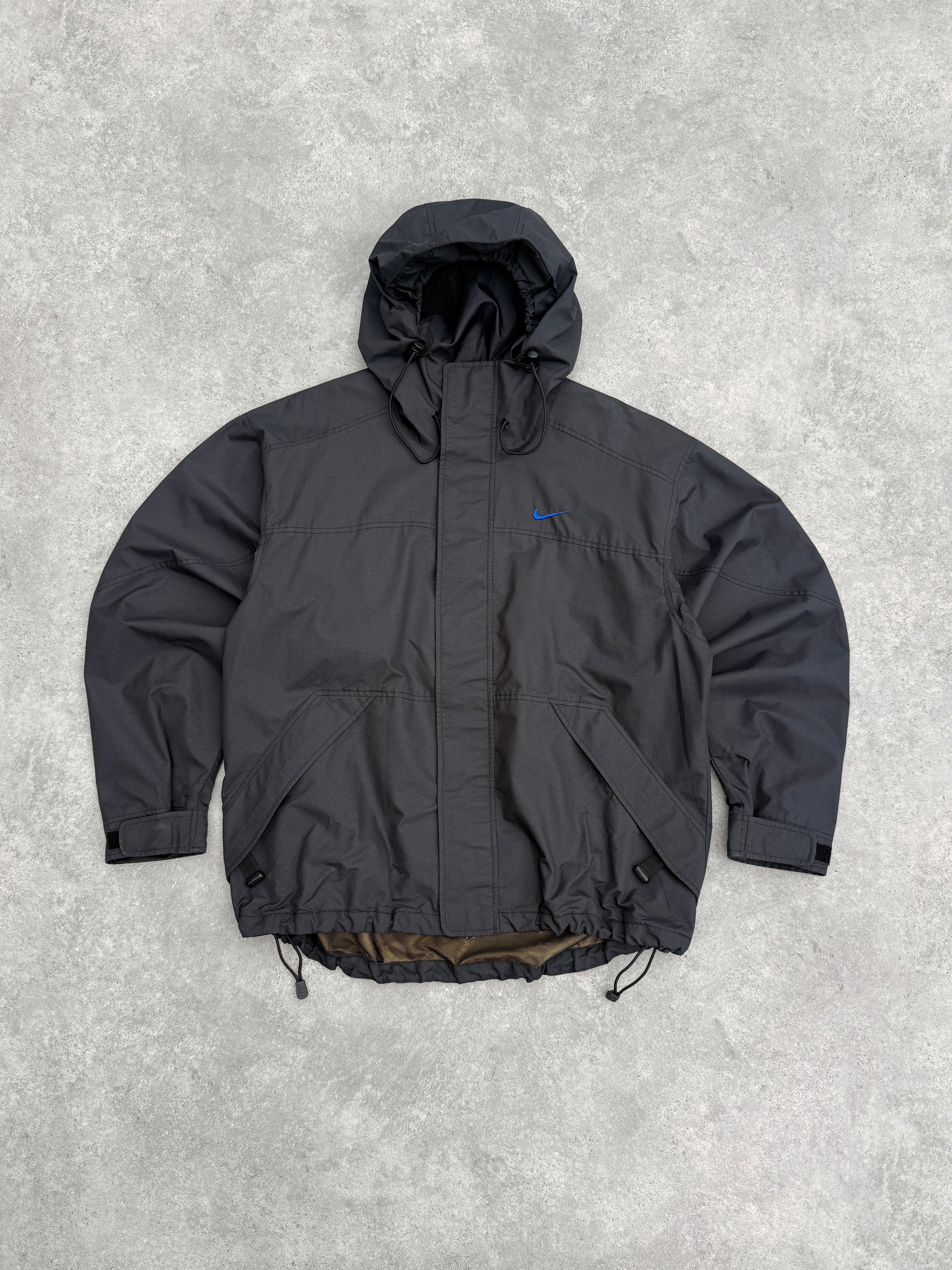 nike acg 1990s lightweight technical waterproof jacket in black, front view