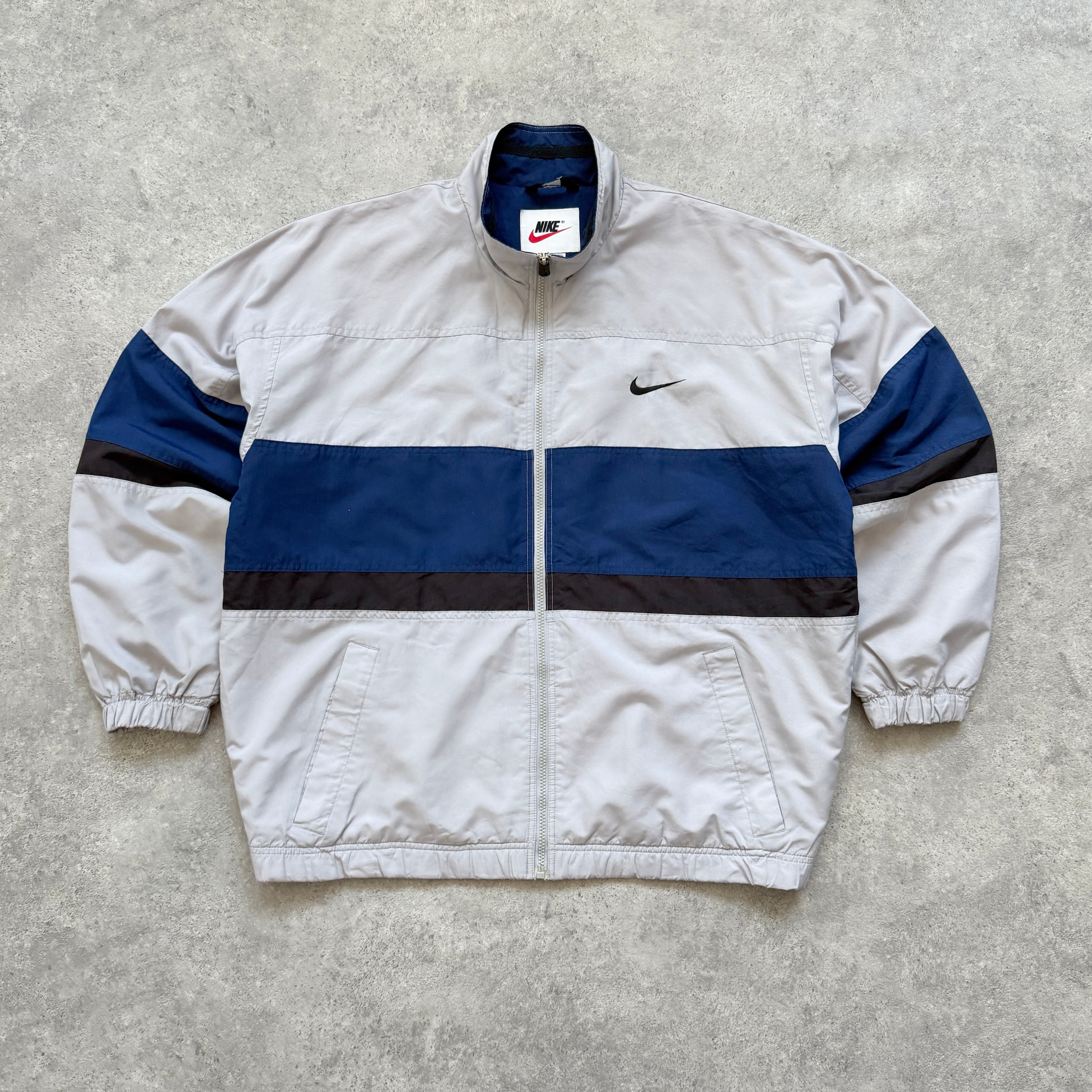 Nike 1990s lightweight embroidered spellout track jacket (L)