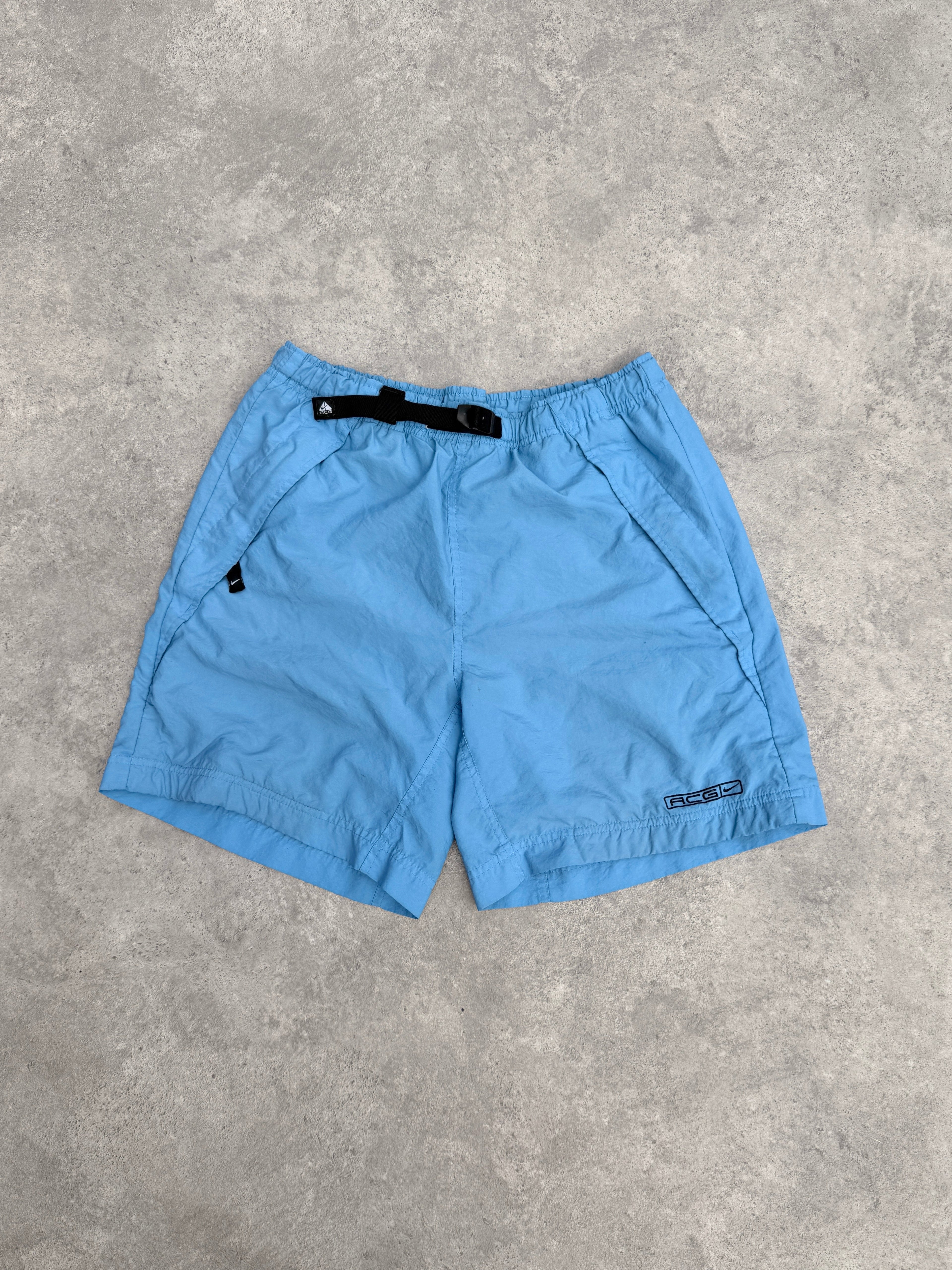 nike acg 1990s technical cargo shorts in sky blue, front view