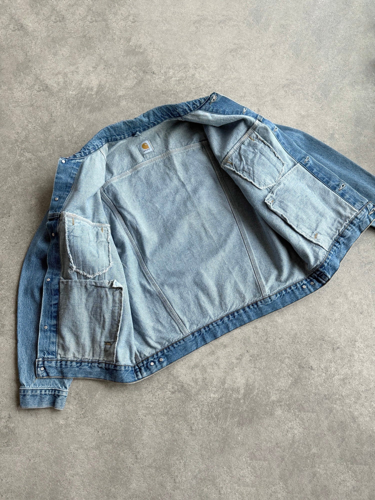 carhartt 1990s j12dst heavyweight denim chore jacket, cuff and waist tab detail