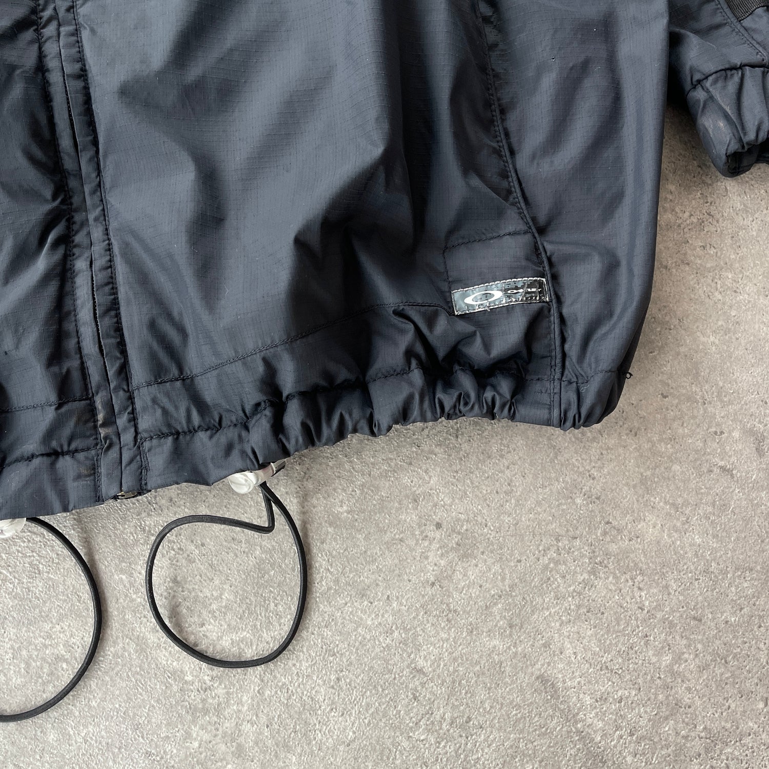 Oakley 2000s technical lightweight spellout jacket (L)