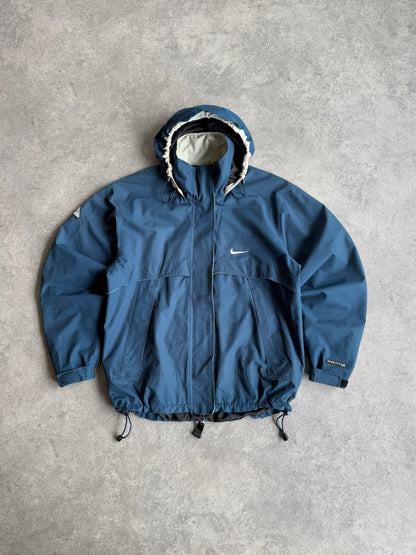 nike acg 1990s lightweight technical waterproof jacket in blue, front view