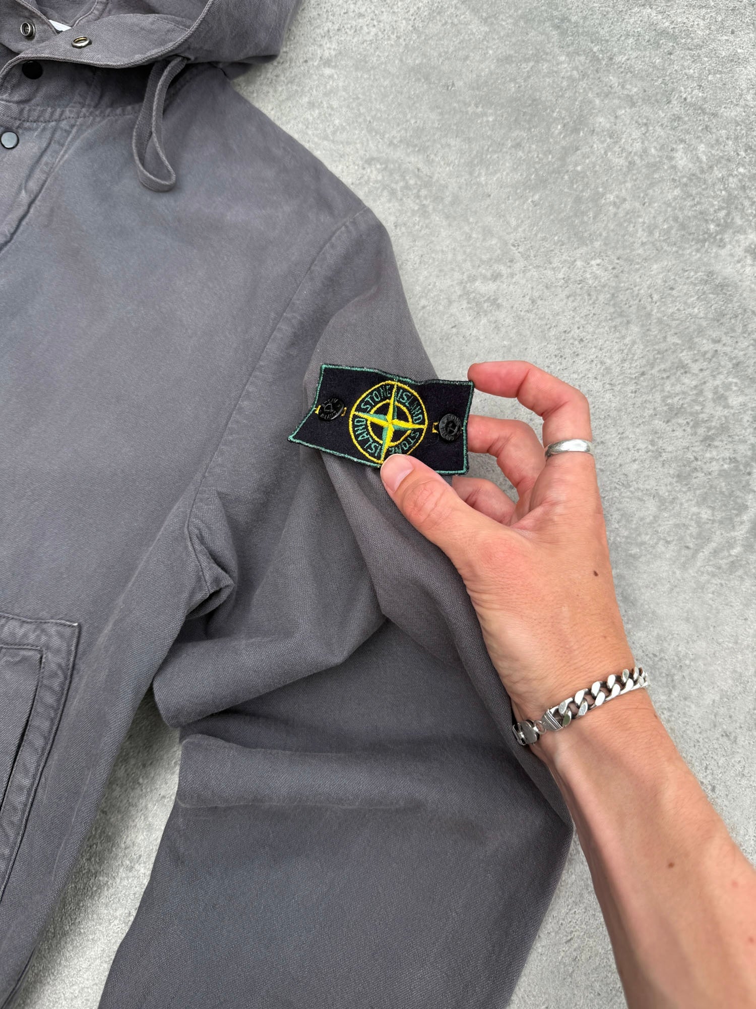stone island s/s 1999 garment dyed hooded jacket in charcoal grey, back view