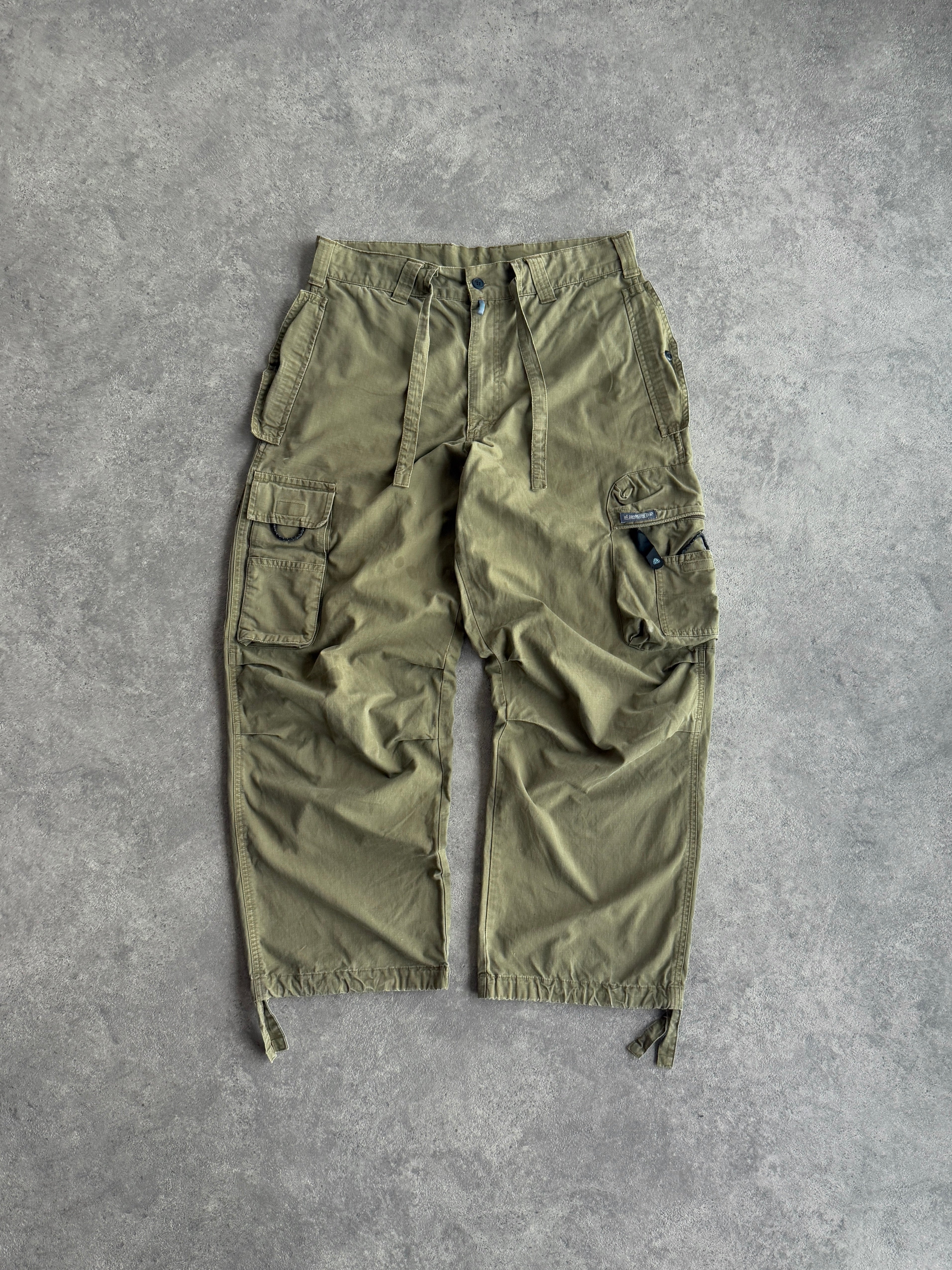 nike acg 2000s technical ripstop cargo trousers in olive green, front view