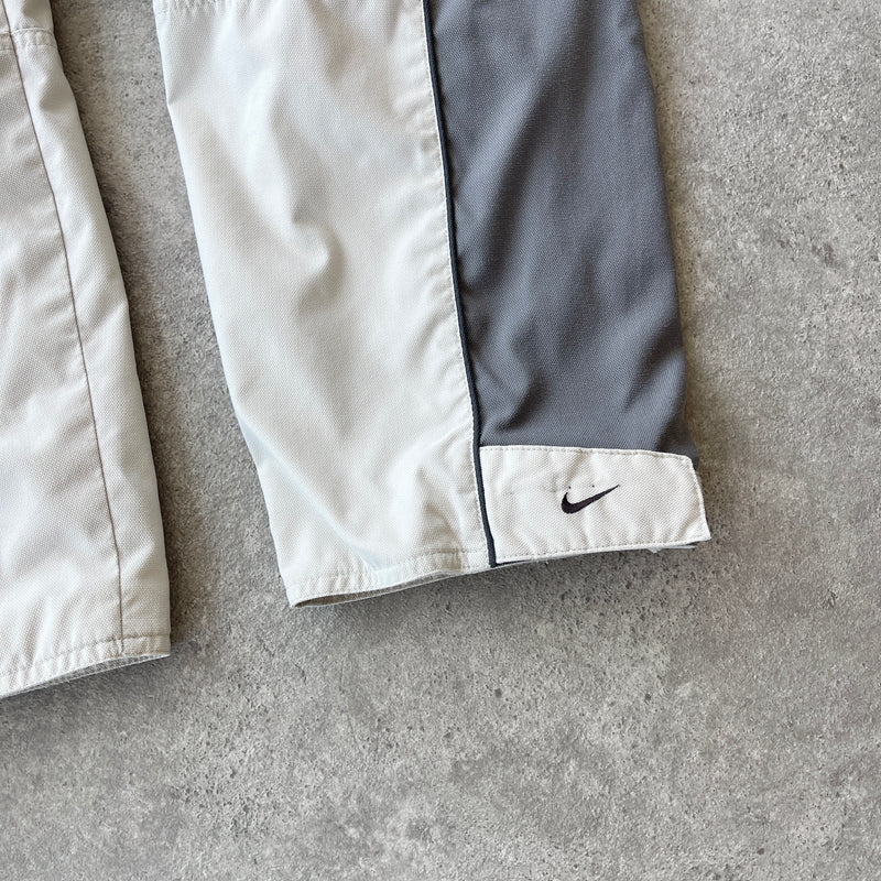 Nike 1990s spellout taped track pants (S)