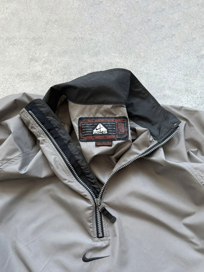 nike acg 1990s packable shell jacket in grey, side view