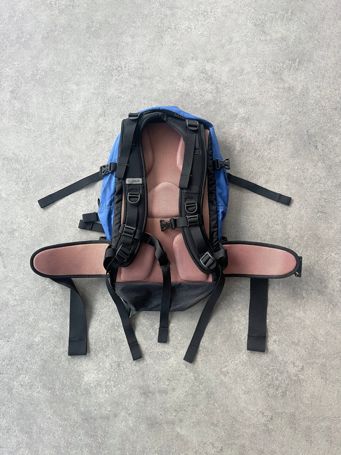 nike acg 1990s 40l technical trekking backpack in blue and grey, back view