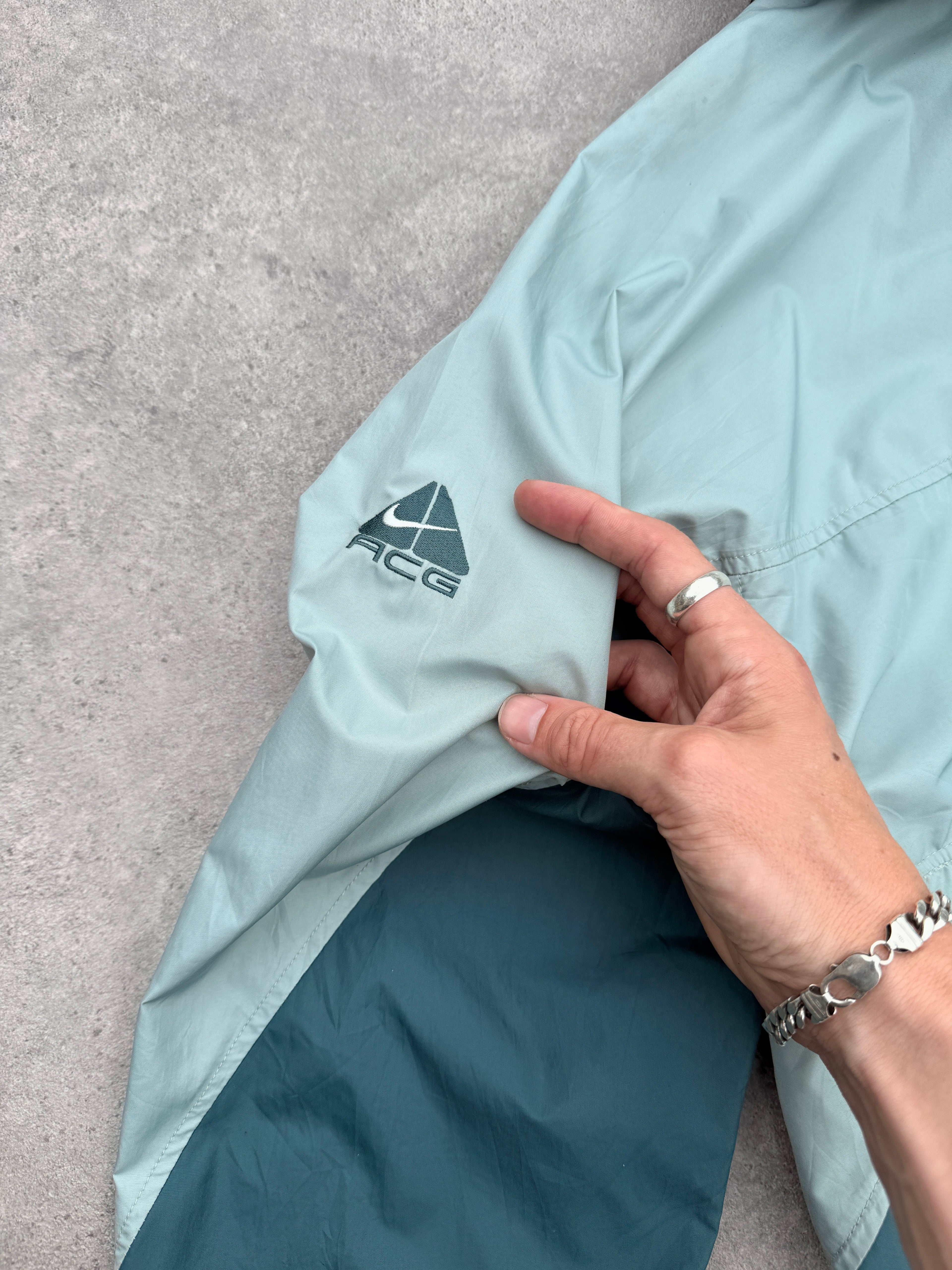 nike acg 1990s colour block packable jacket, side view