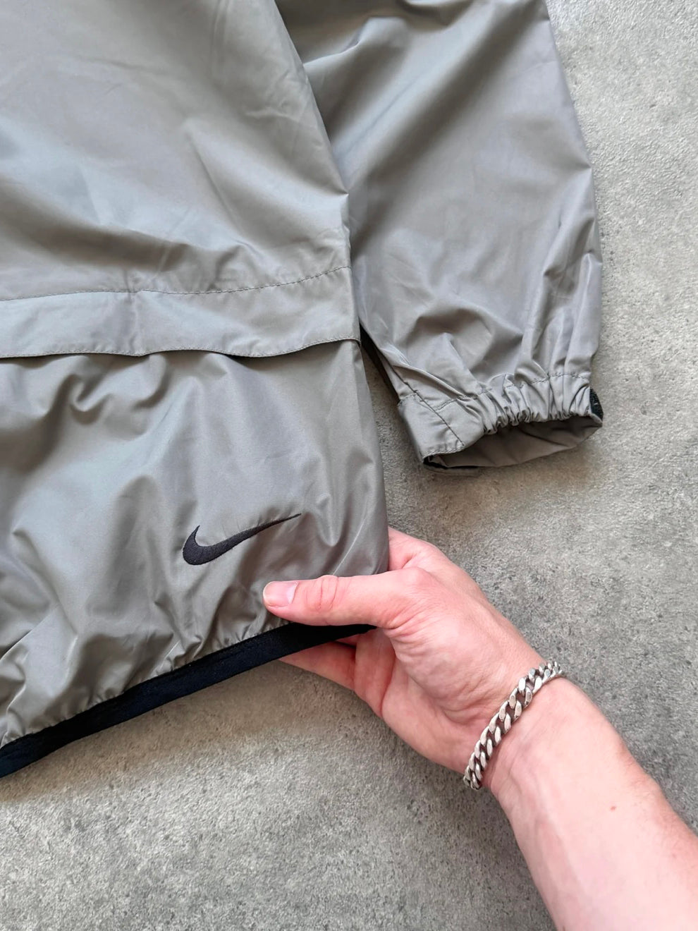 nike acg 1990s packable shell jacket, cuff and velcro fastening detail