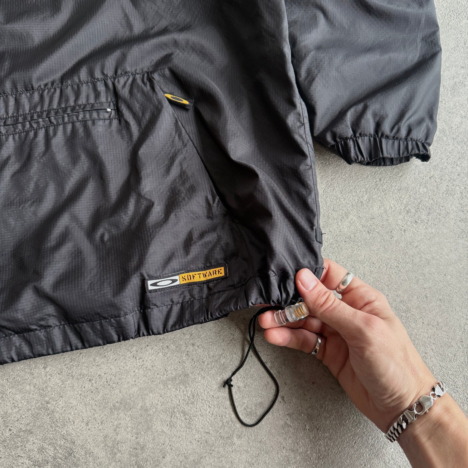 Oakley Software 2000s asymmetric technical shell jacket (M)