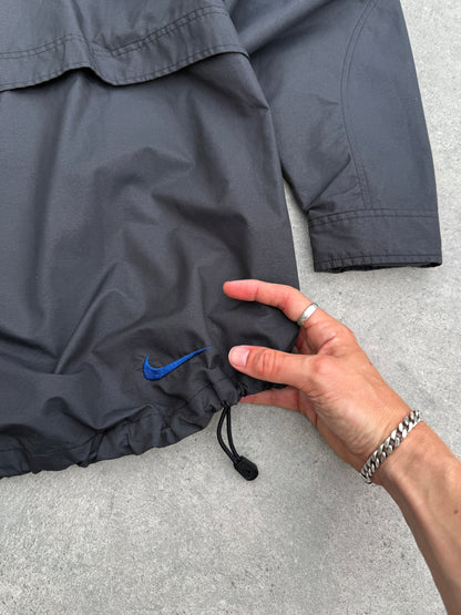 nike acg 1990s lightweight technical waterproof jacket, hem toggle detail