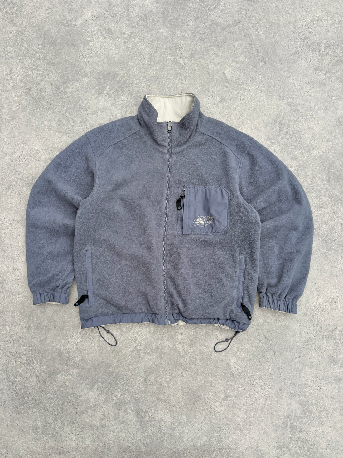 nike acg 2000s reversible storm clad fleece jacket in cream, fleece side front view