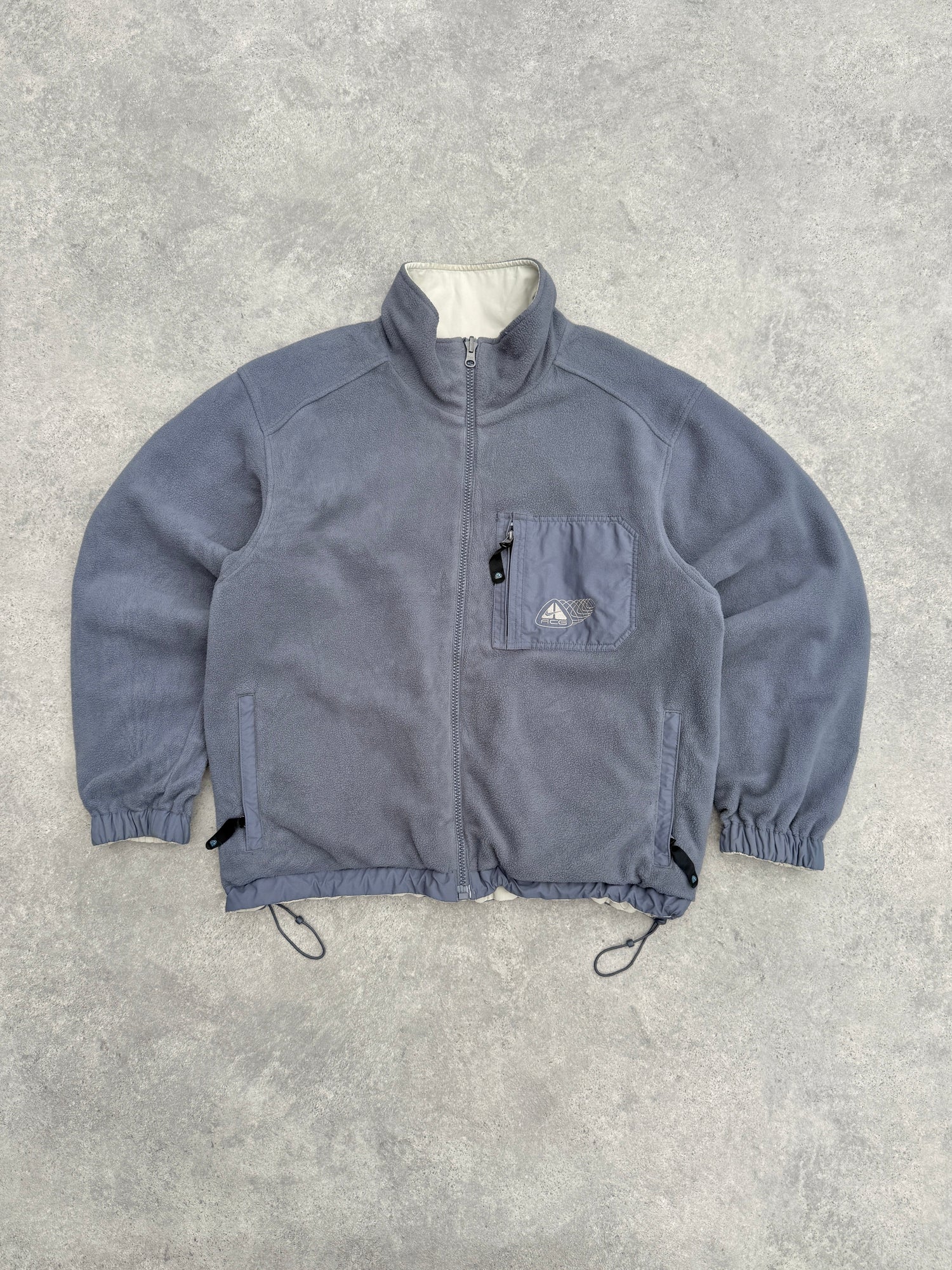 nike acg 2000s reversible storm clad fleece jacket in cream, fleece side front view