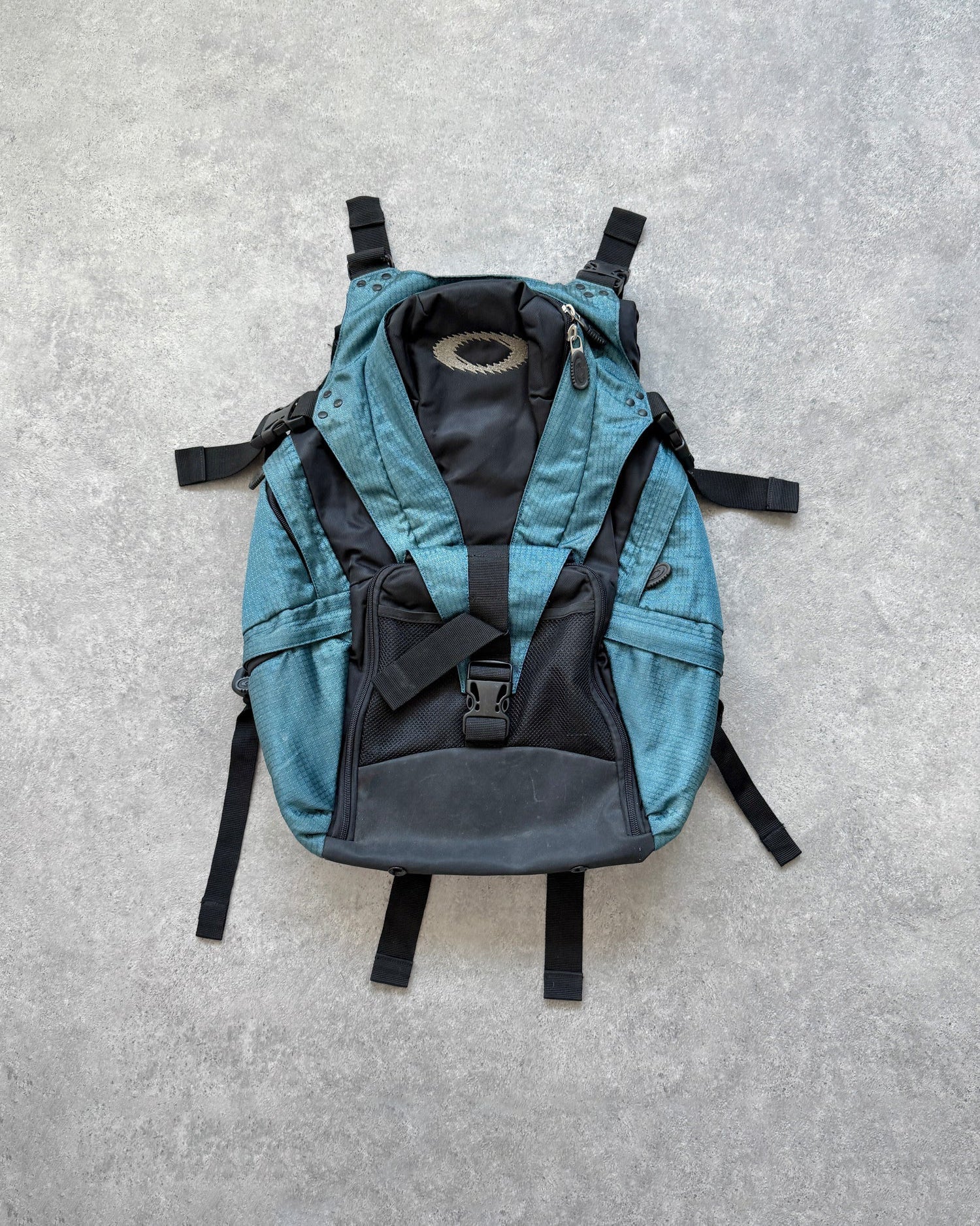 oakley software 2000s technical utility backpack in teal, front view