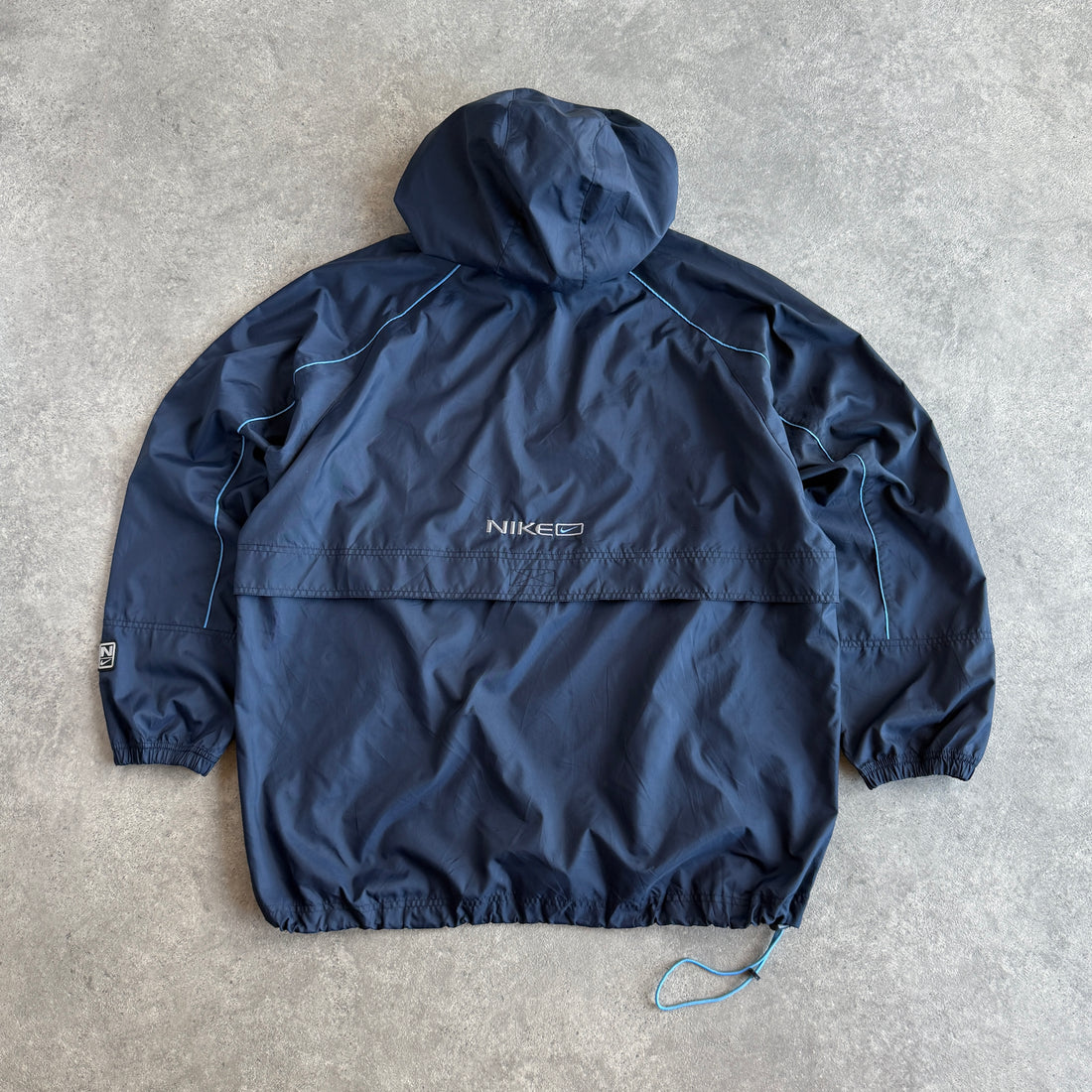 Nike 2000s 1/4 zip technical spellout shell jacket (XL)