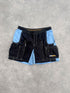 oakley software 2000s technical cargo shorts in black and sky blue, front view