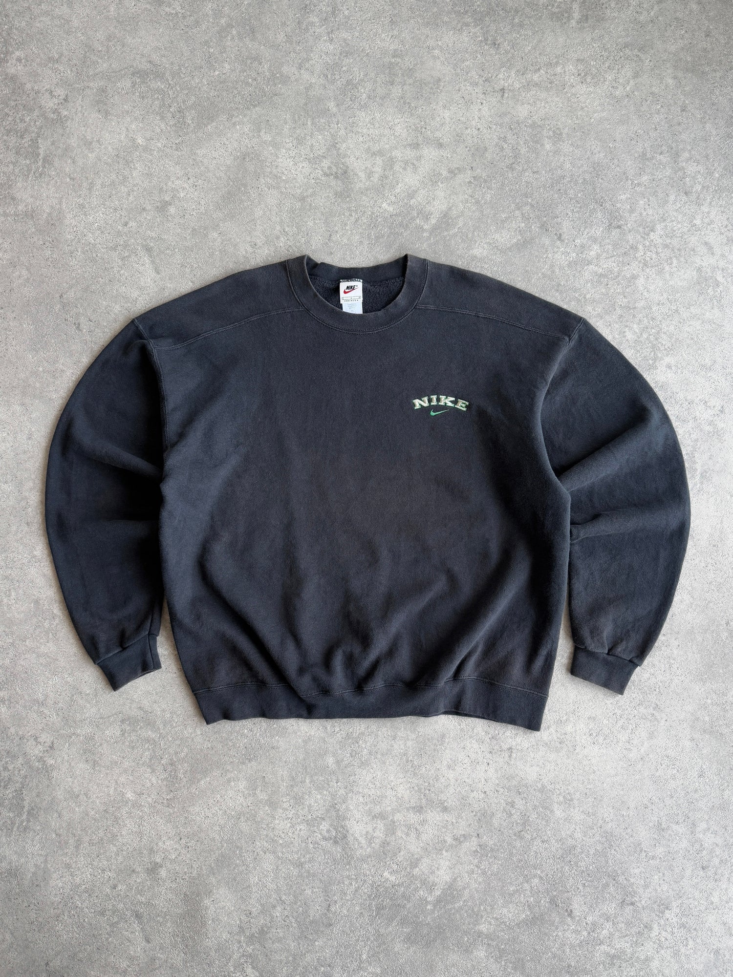 nike 1990s heavyweight embroidered spellout sweatshirt in washed black, front view