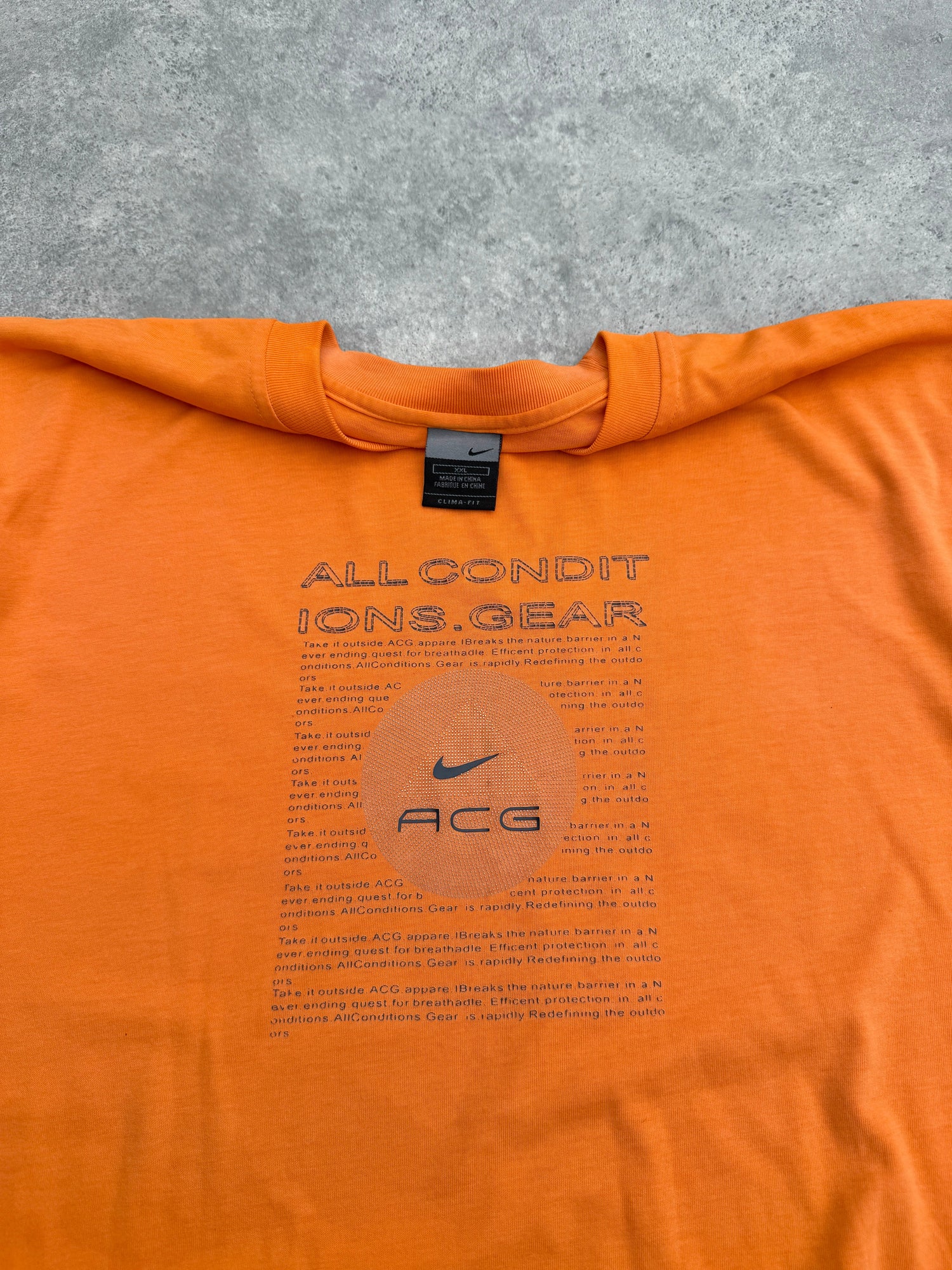 nike acg 2001 heavyweight graphic t-shirt in orange, graphic print detail