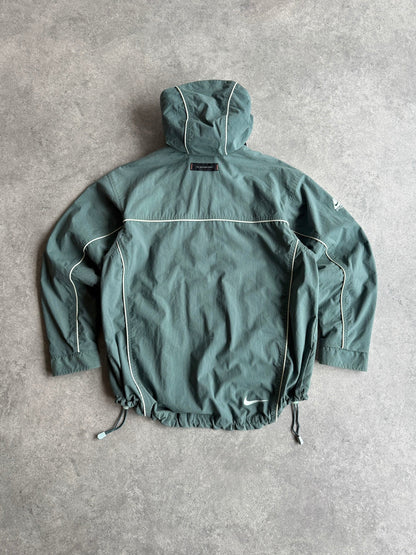 nike acg 1990s storm fit heavyweight technical waterproof jacket in muted green, back view