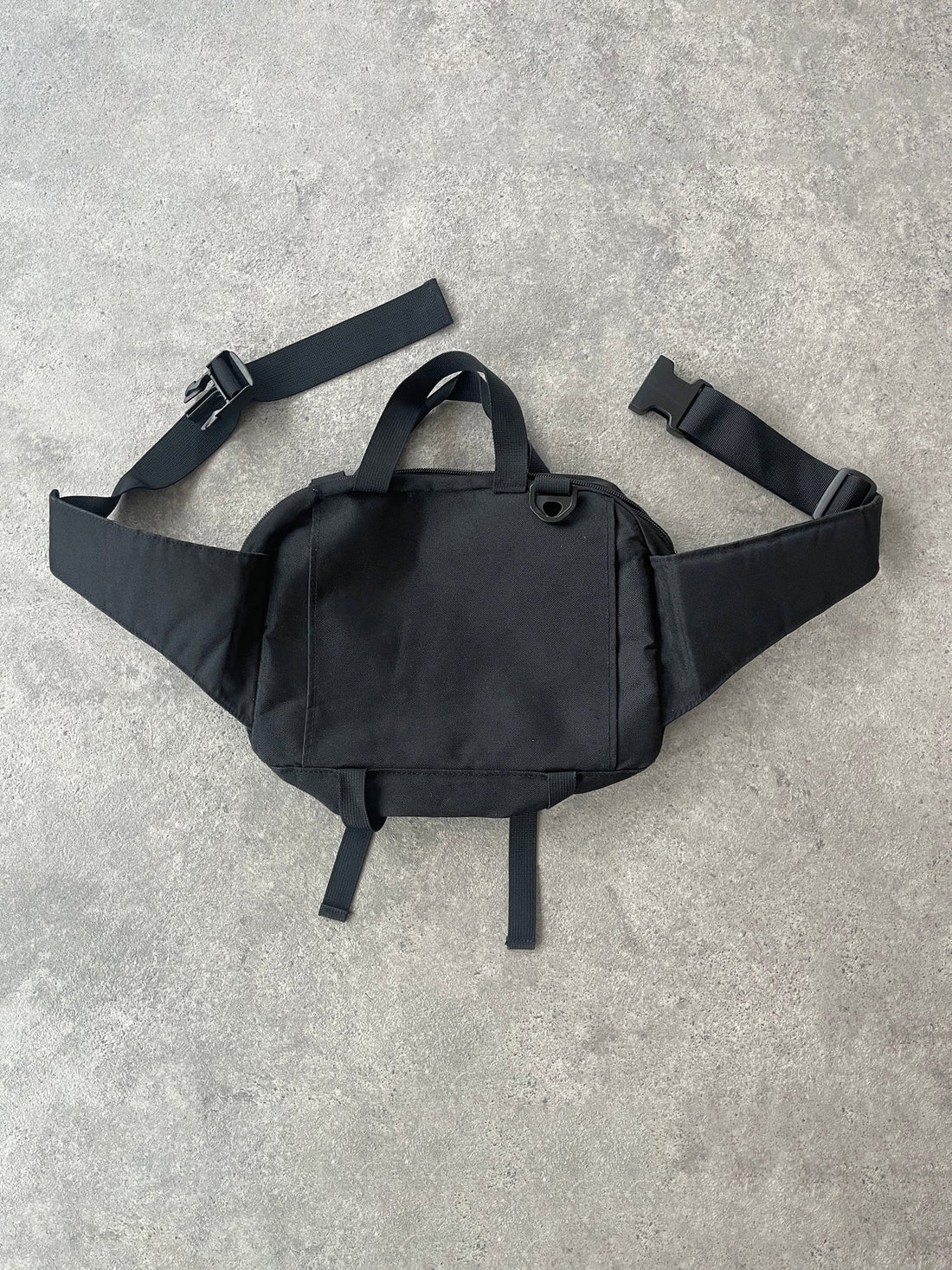 nike acg 1990s crossbody technical utility bag in black, back view