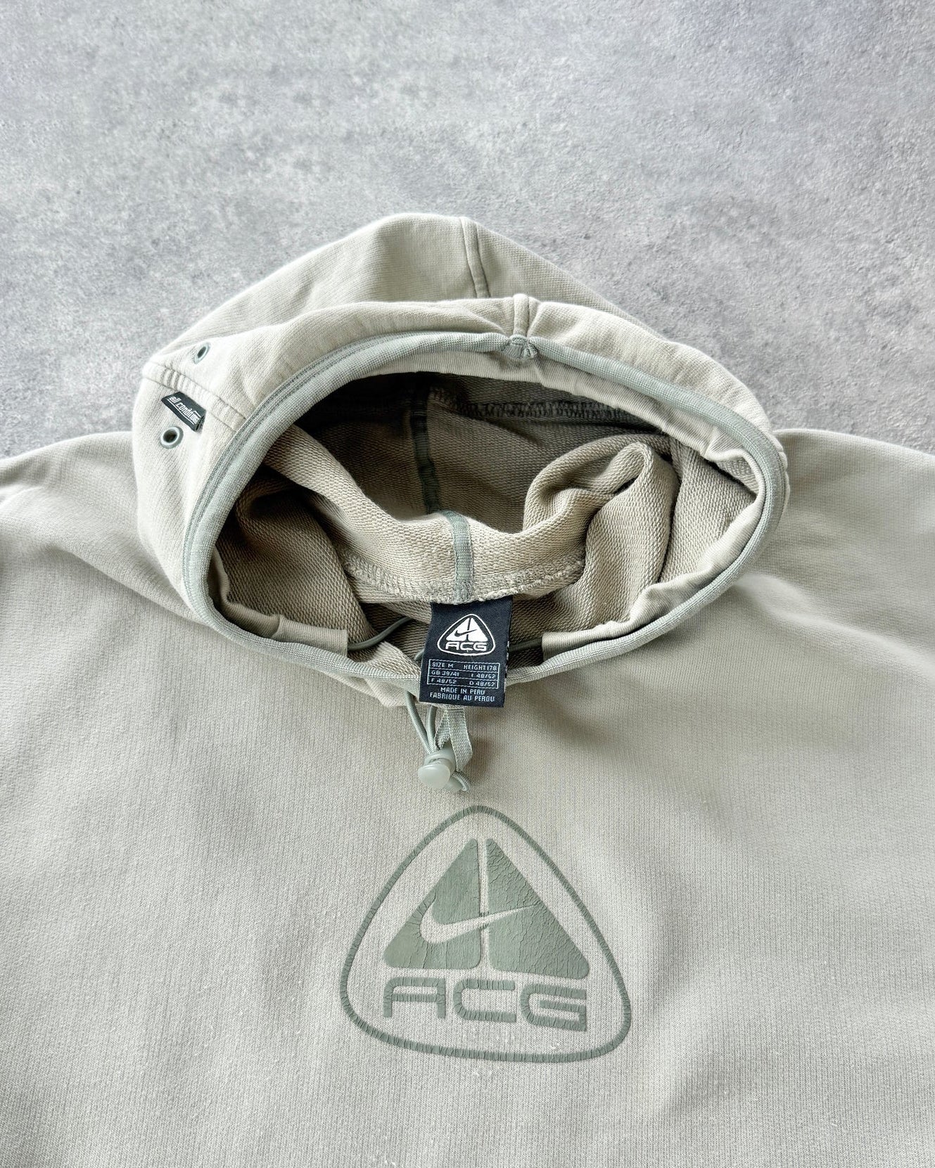 nike acg 2000s technical balaclava hoodie in sage, logo view