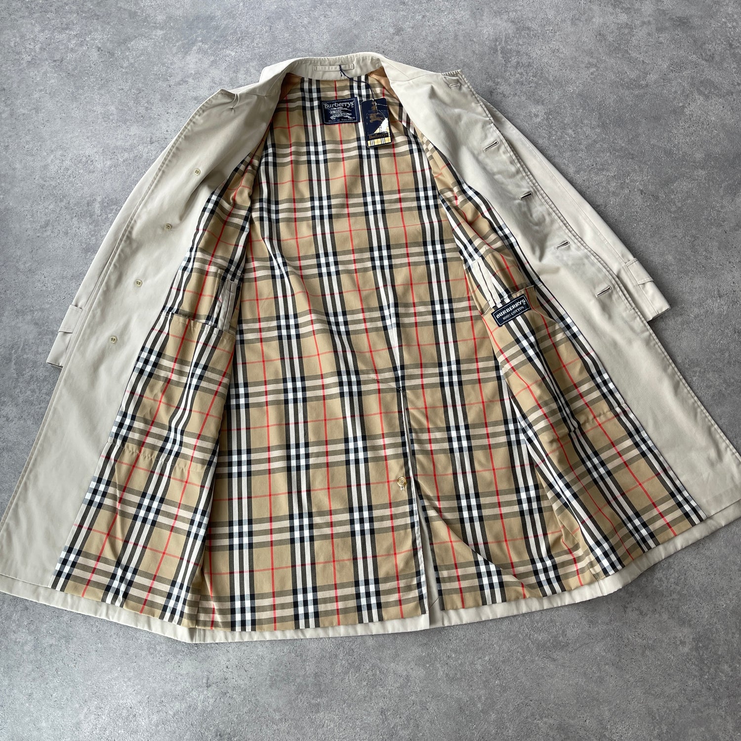 Burberry’s 1990s nova check cream trench jacket (M)