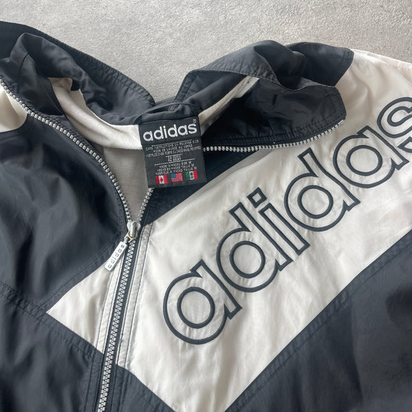 Adidas 1990s lightweight embroidered spellout shell jacket (M)