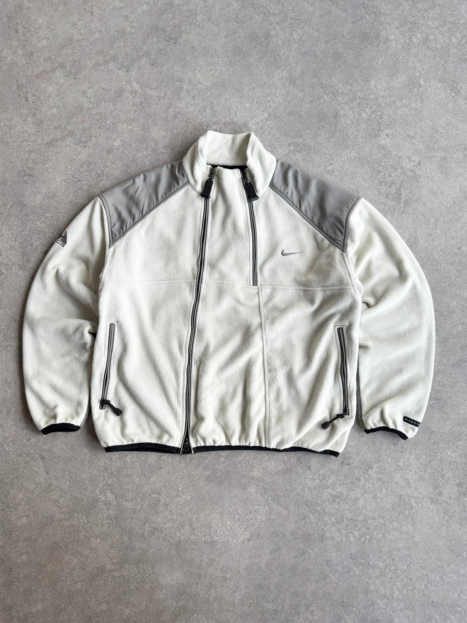 nike acg 1990s technical dual zip polartec fleece in off-white, front view