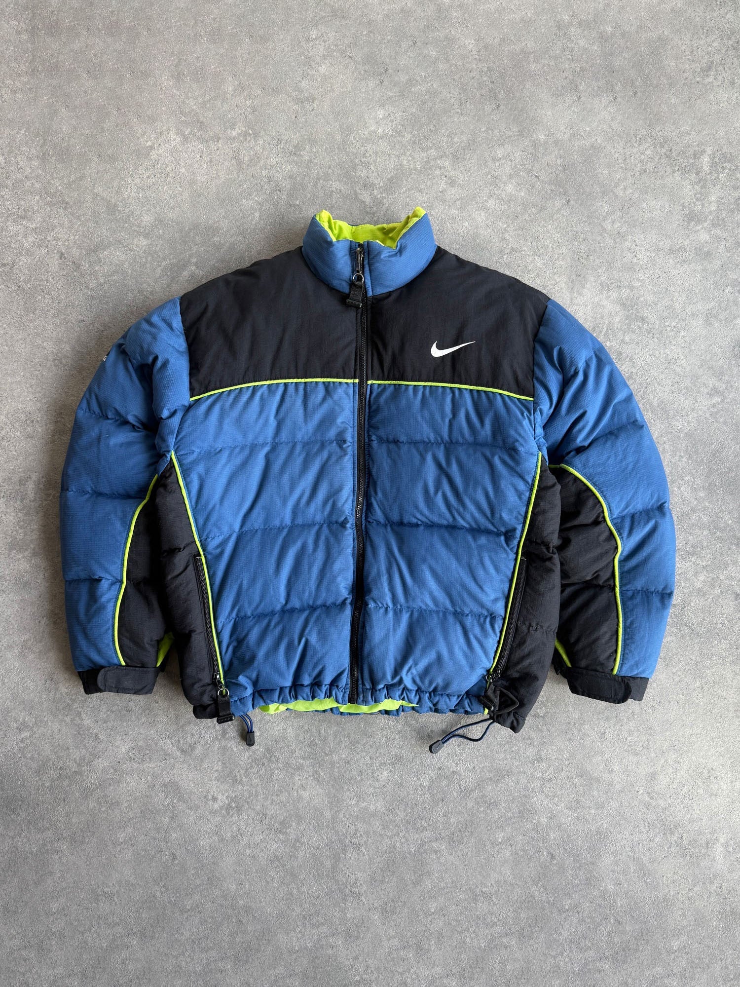 nike acg 1998 technical down fill puffer jacket in blue and black, front view