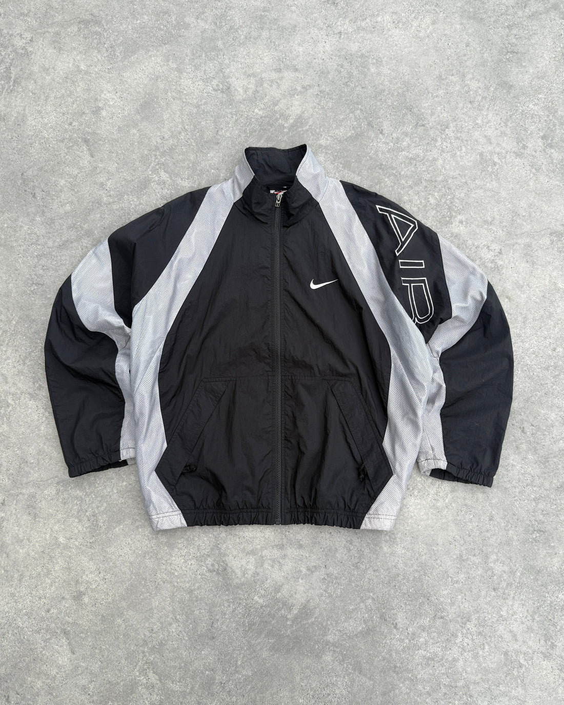 nike air 1990s lightweight swoosh shell jacket, front view