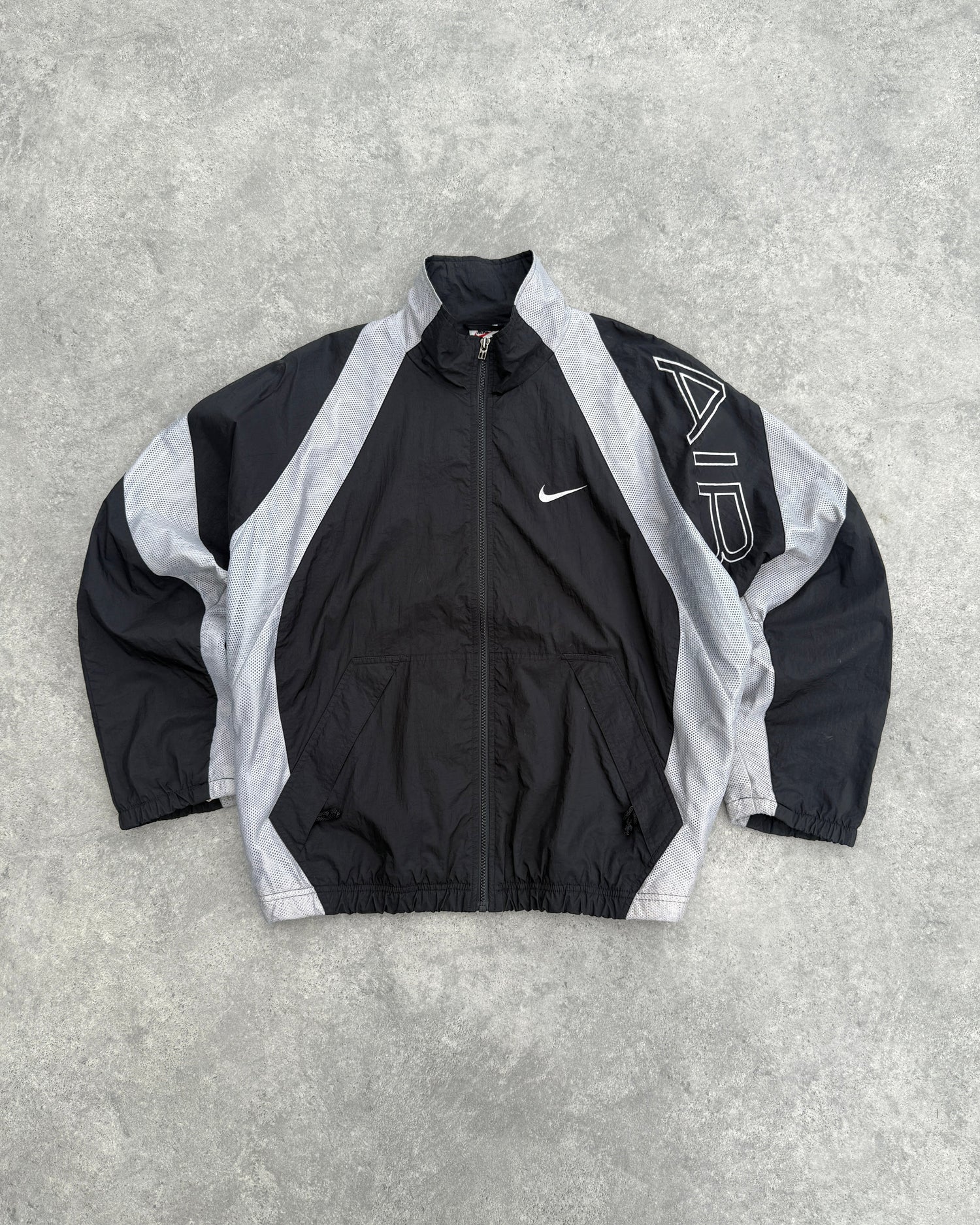 nike air 1990s lightweight swoosh shell jacket, front view