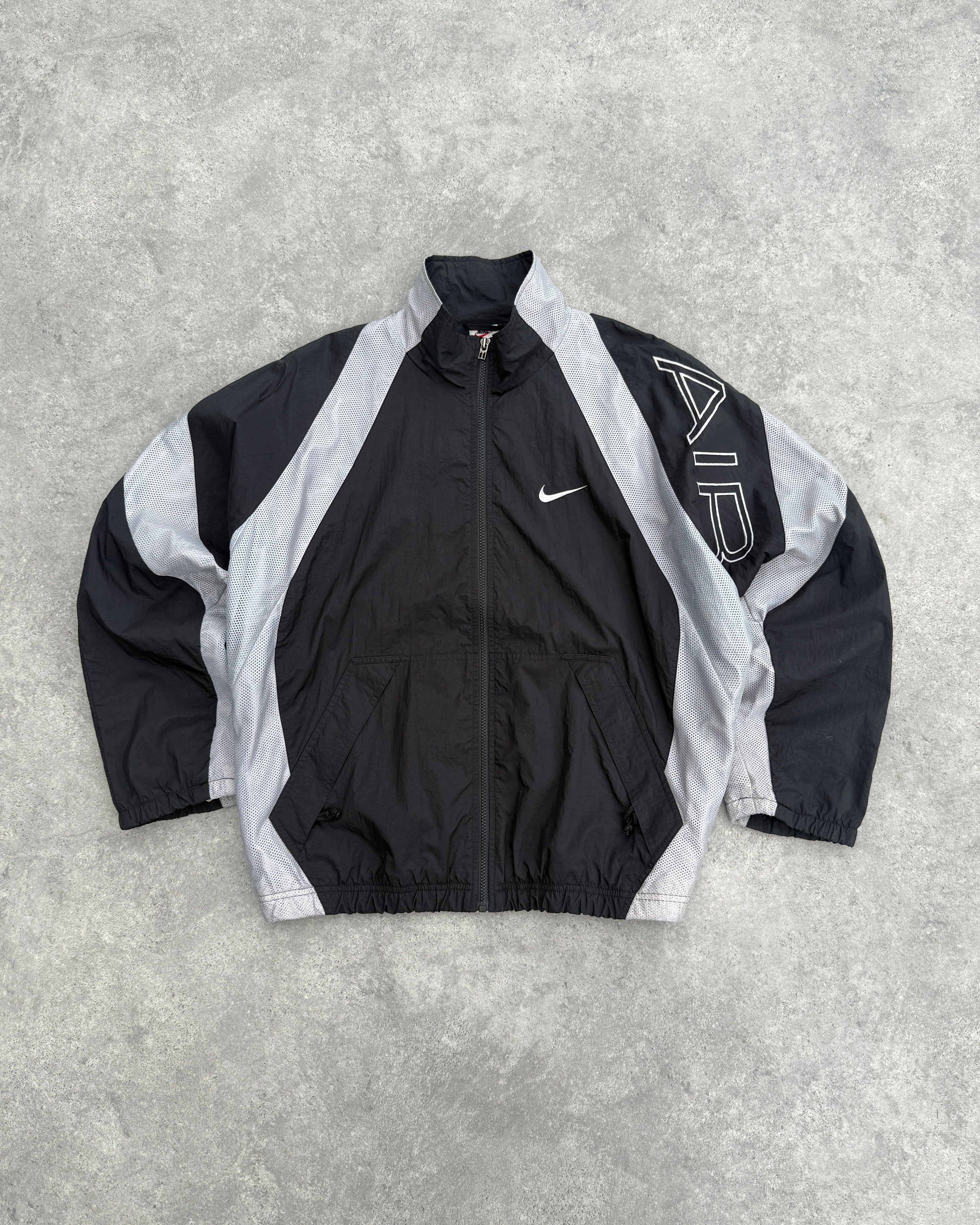 nike air 1990s lightweight swoosh shell jacket, front view