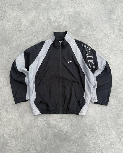 nike air 1990s lightweight swoosh shell jacket, front view
