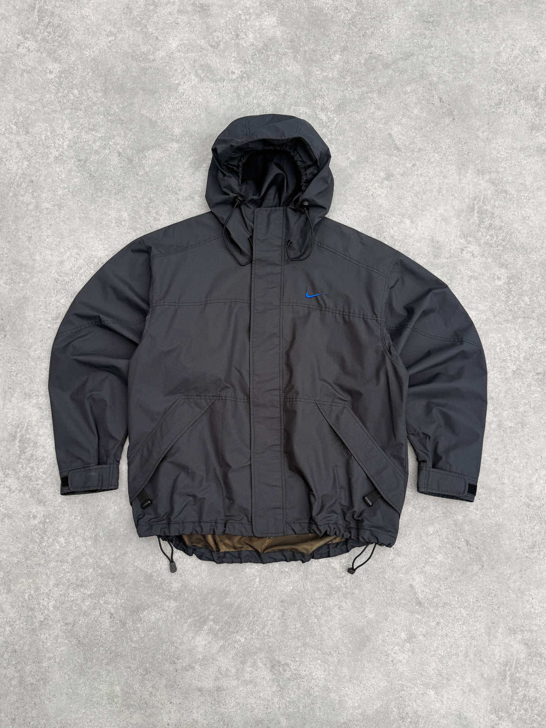 nike acg 1990s lightweight technical waterproof jacket in black, front view