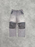 nike acg 2000s technical corduroy cargo trousers in faded grey, front view