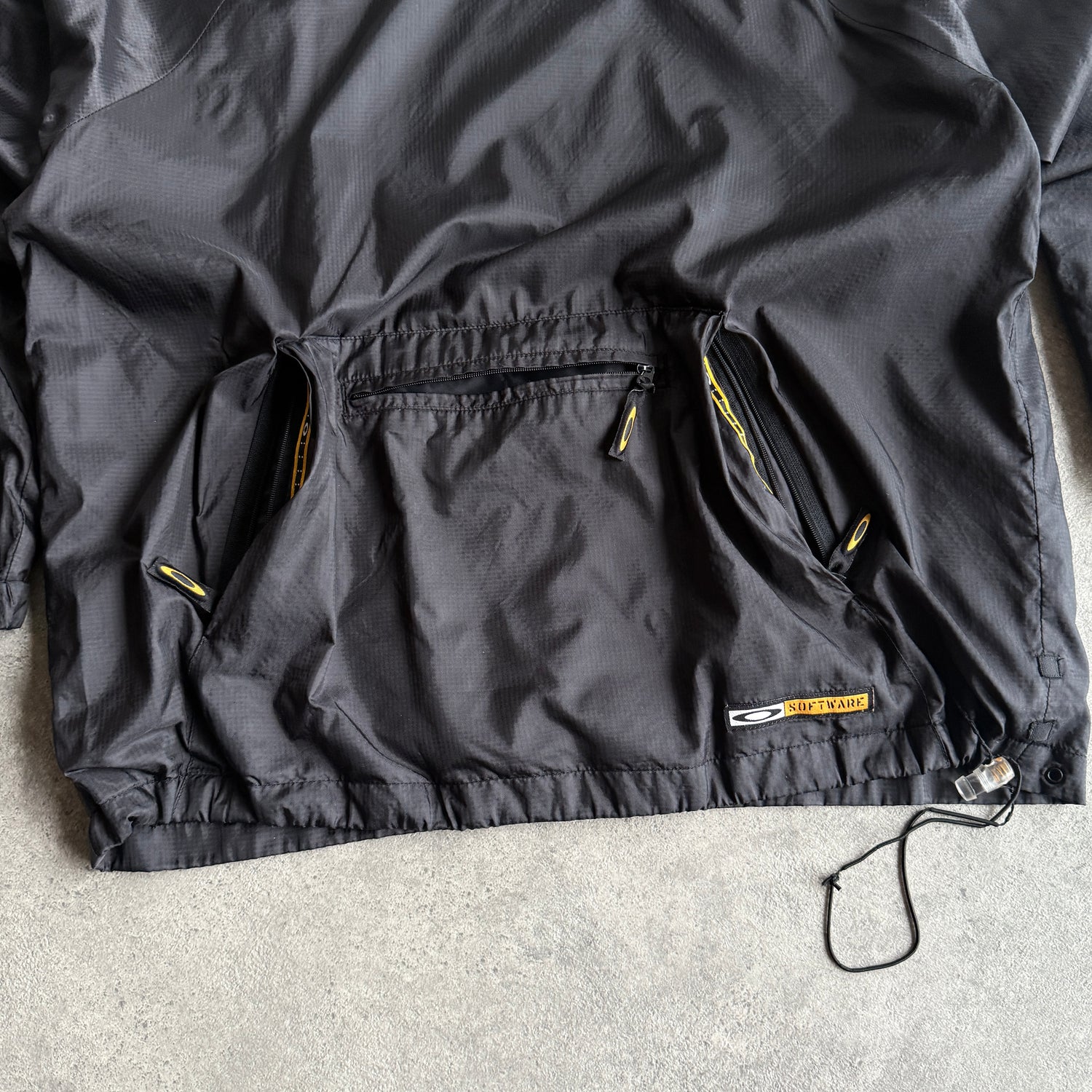 Oakley Software 2000s asymmetric technical shell jacket (M)