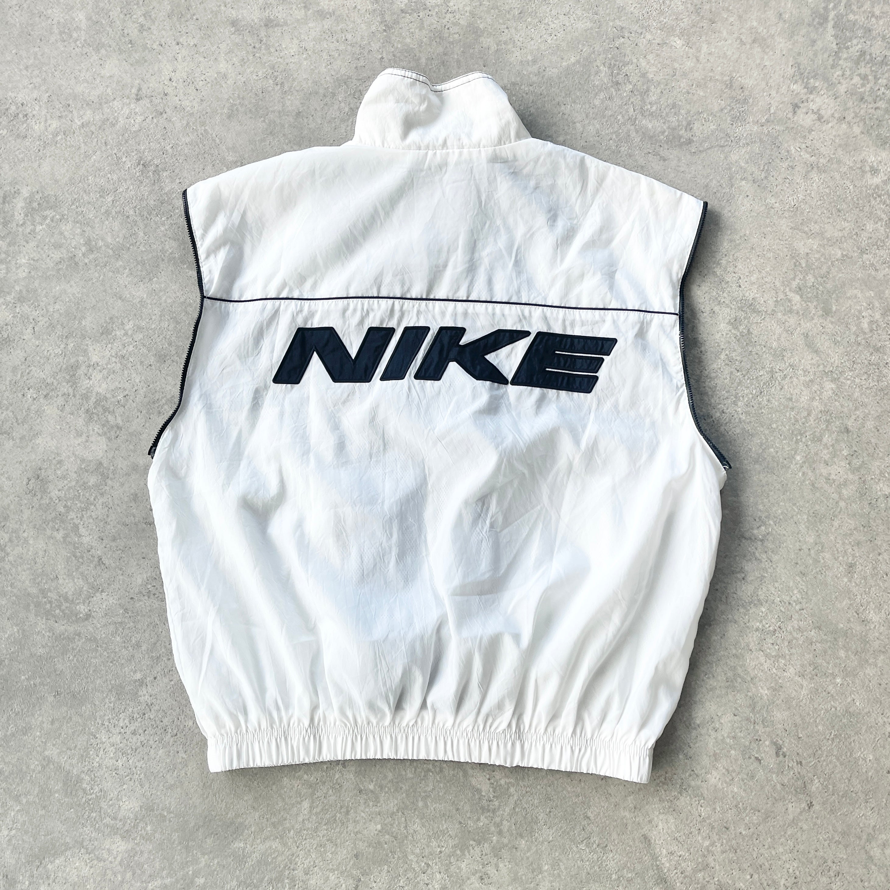 Nike 1990s lightweight convertible spellout shell jacket (S)