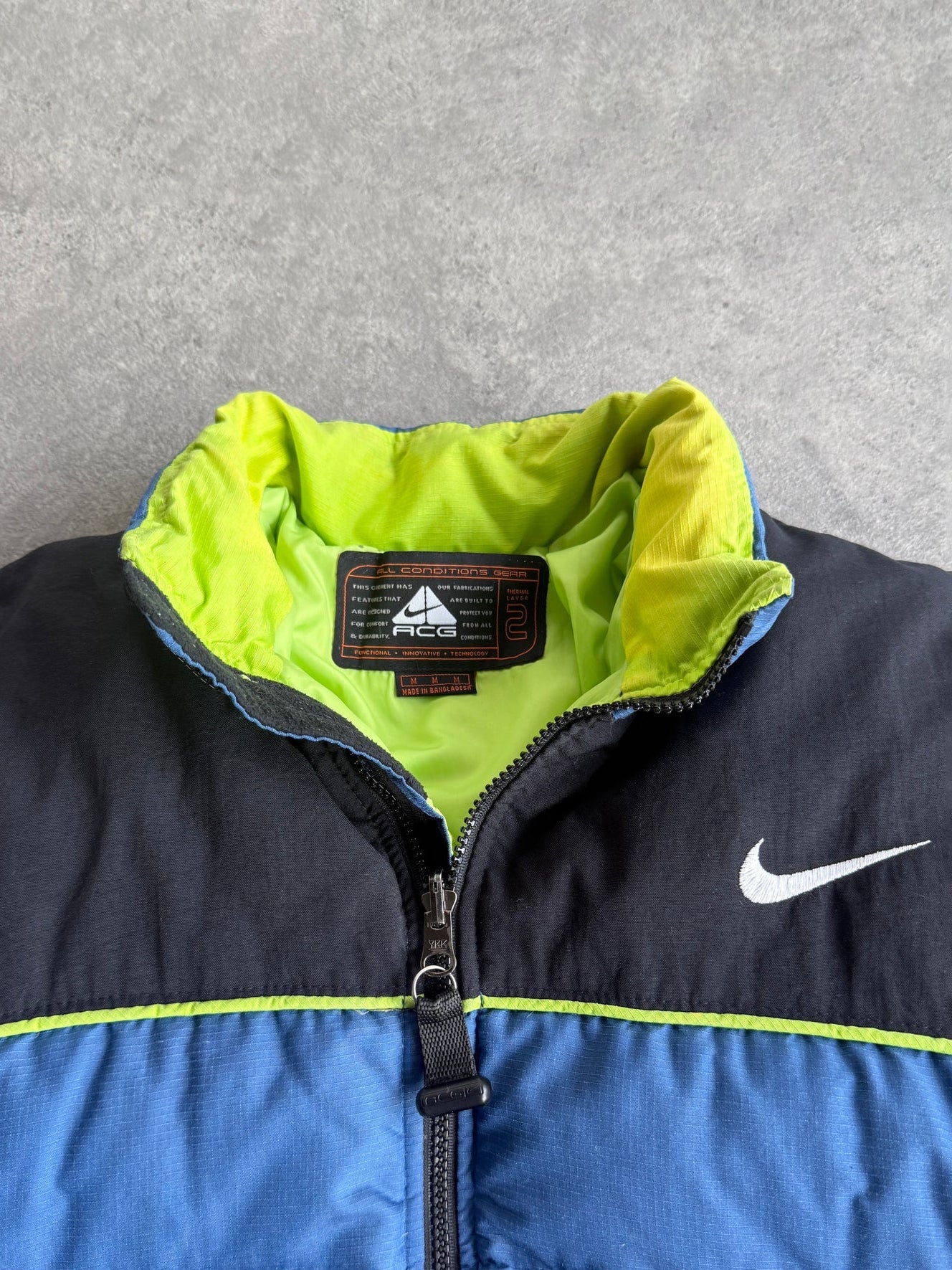 nike acg 1998 technical down fill puffer jacket, neon lining detail