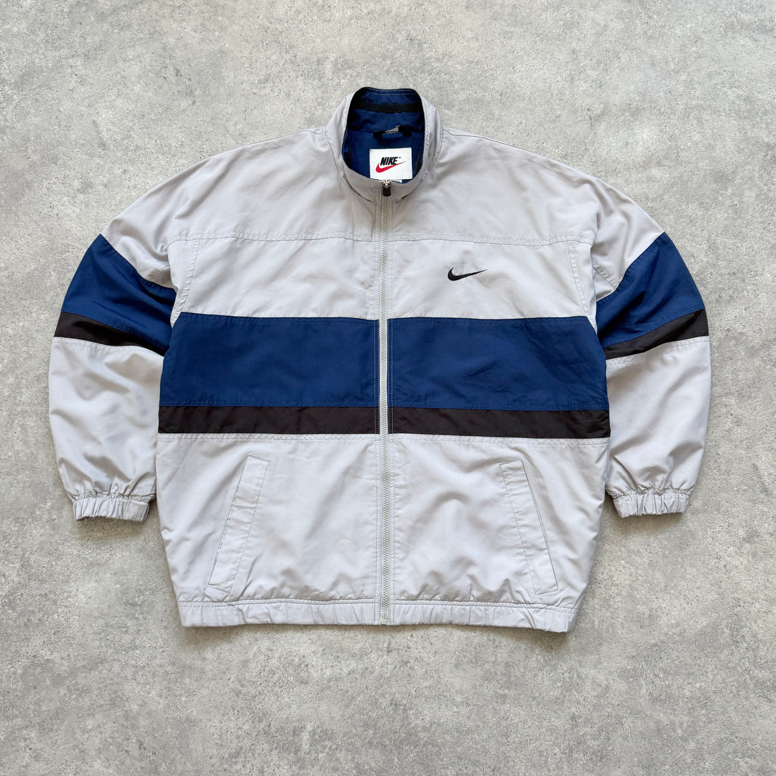Nike 1990s lightweight embroidered spellout track jacket (L)