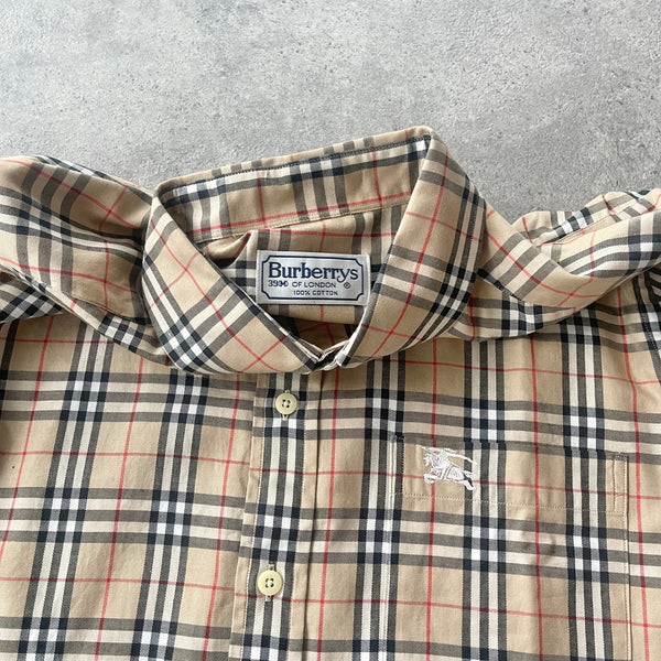 Burberry’s 1990s nova check button up shirt (M)